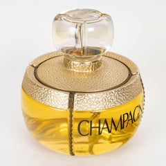 Giant, große Champage-Parfümflasche, Yves Saint Laurent, XX. Jahrhundert.