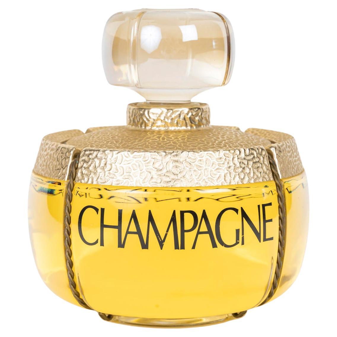 Botella gigante de perfume Champage, Yves Saint Laurent, Siglo XX.