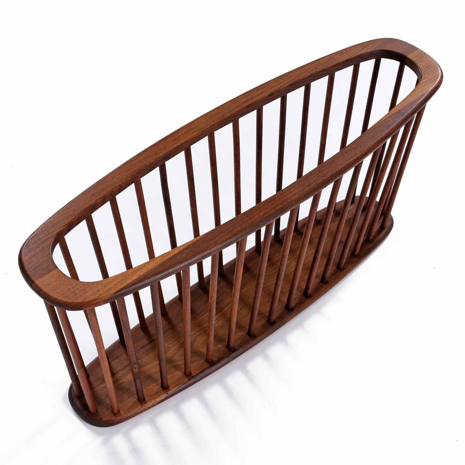 This handsome magazine rack by Arthur Umanoff is the 