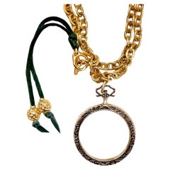 Giant magnifying glass pendant necklace