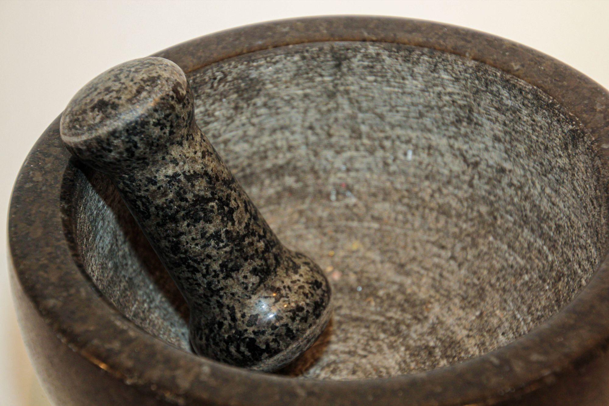 Italian deep black polished marble giant mortar bowl and pestle.
Mortar and pestle set has been used for thousand of years as the way to crush, grind and powder herbs and dry spices.
The traditional manual grinding method ensures that all cooking