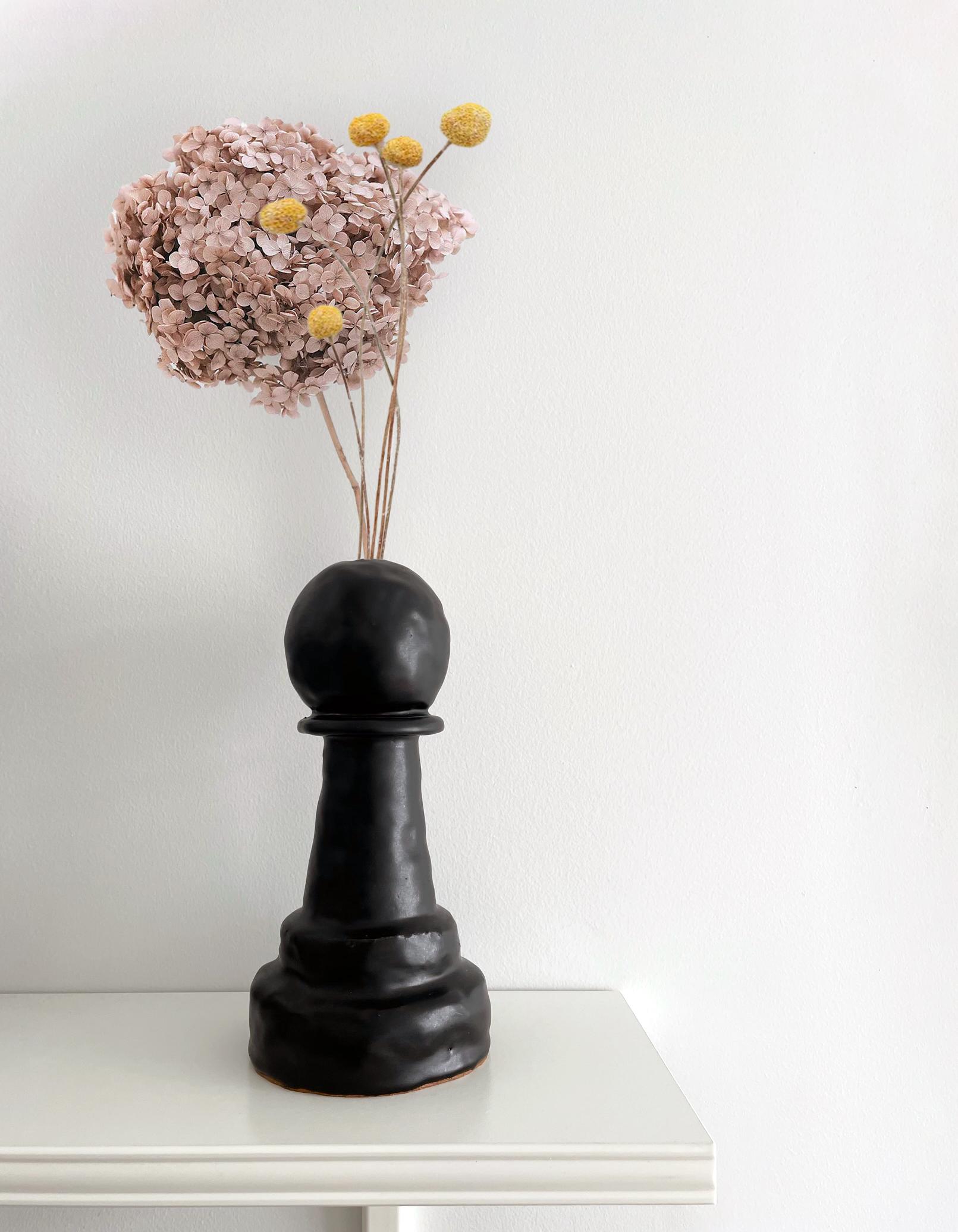 This is a one of a kind piece handcrafted in Brooklyn, NY by ceramicist and interior designer Catie Curry. The above listed piece is available for immediate purchase, but other chess pieces can be recreated upon request. 

This is a part of the
