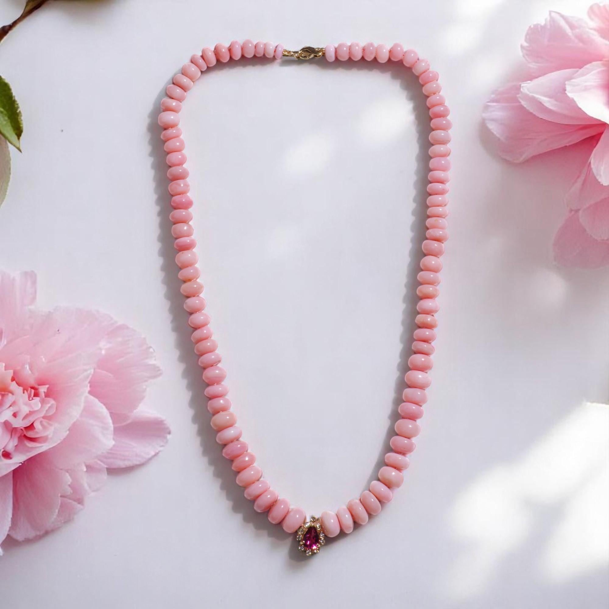 Step into a world of exclusive elegance with this one of a kind blush pink opal necklace, made from the most exclusive and rare pink opals from Peru. 
Featuring a yellow gold clasp, sparkling diamonds , pink tourmaline and the highest grade pink