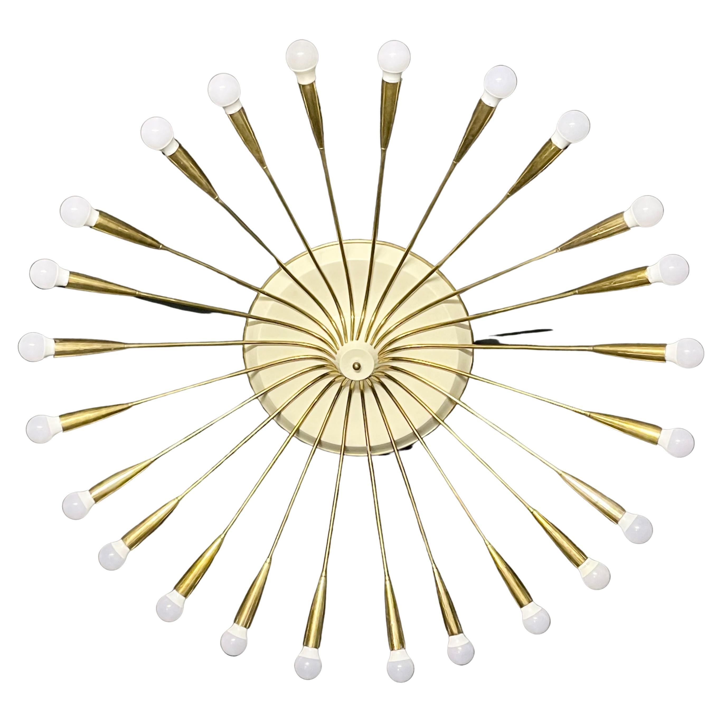 A huge German mid -century 24 -light Sputnik flush mount, Germany, circa 1950s.
This chandelier is made of polished brass and lacquered metal.
Measures: Diameter: 51.18 inches (without bulbs) 
Height: 11.81 inches
Socket: 24 x E27 or E26 for