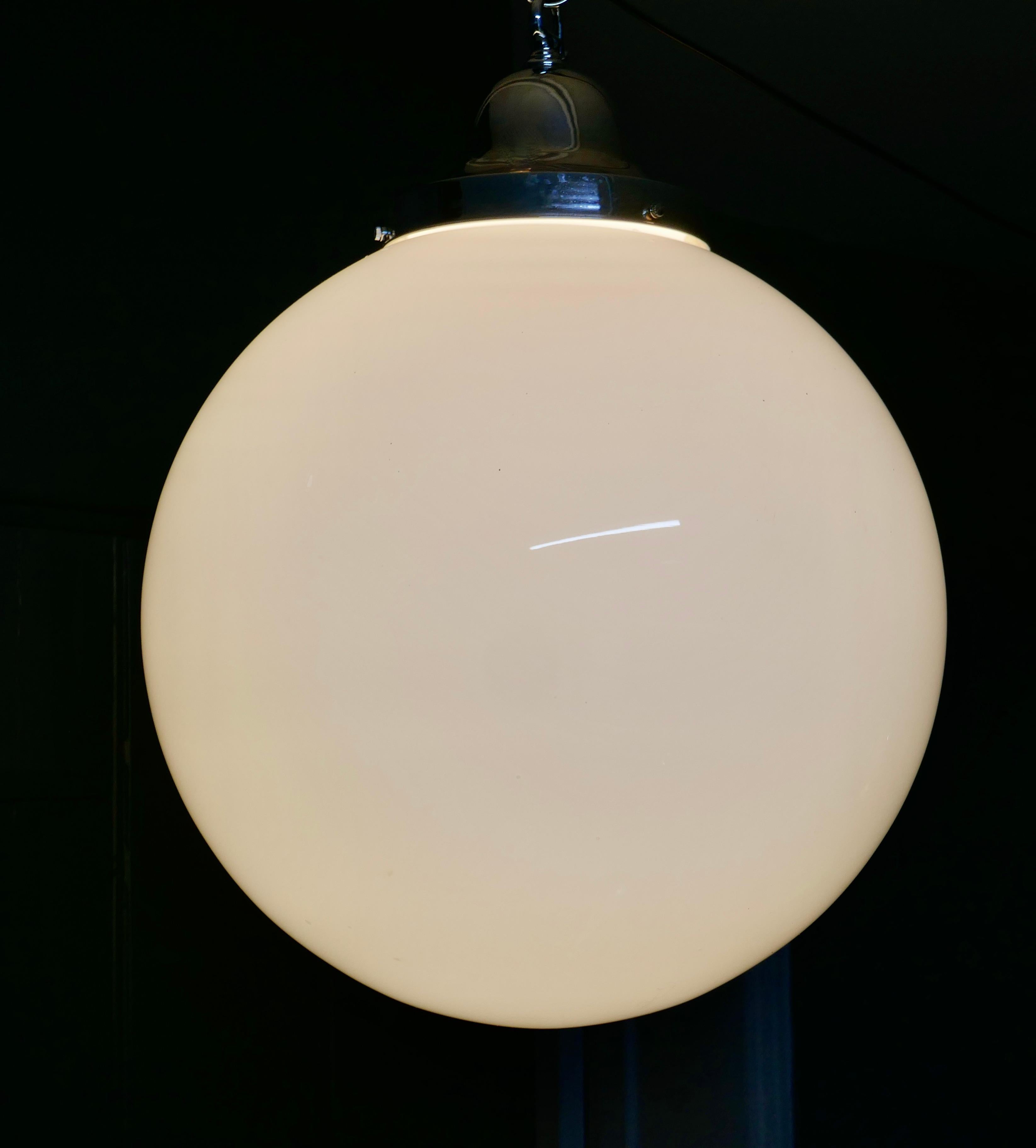 Mid-20th Century Giant Retro Glass Globe Hanging Light  We have 2 of these beautiful large lamps  For Sale