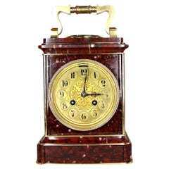 Horloge géante à chariot en marbre rouge