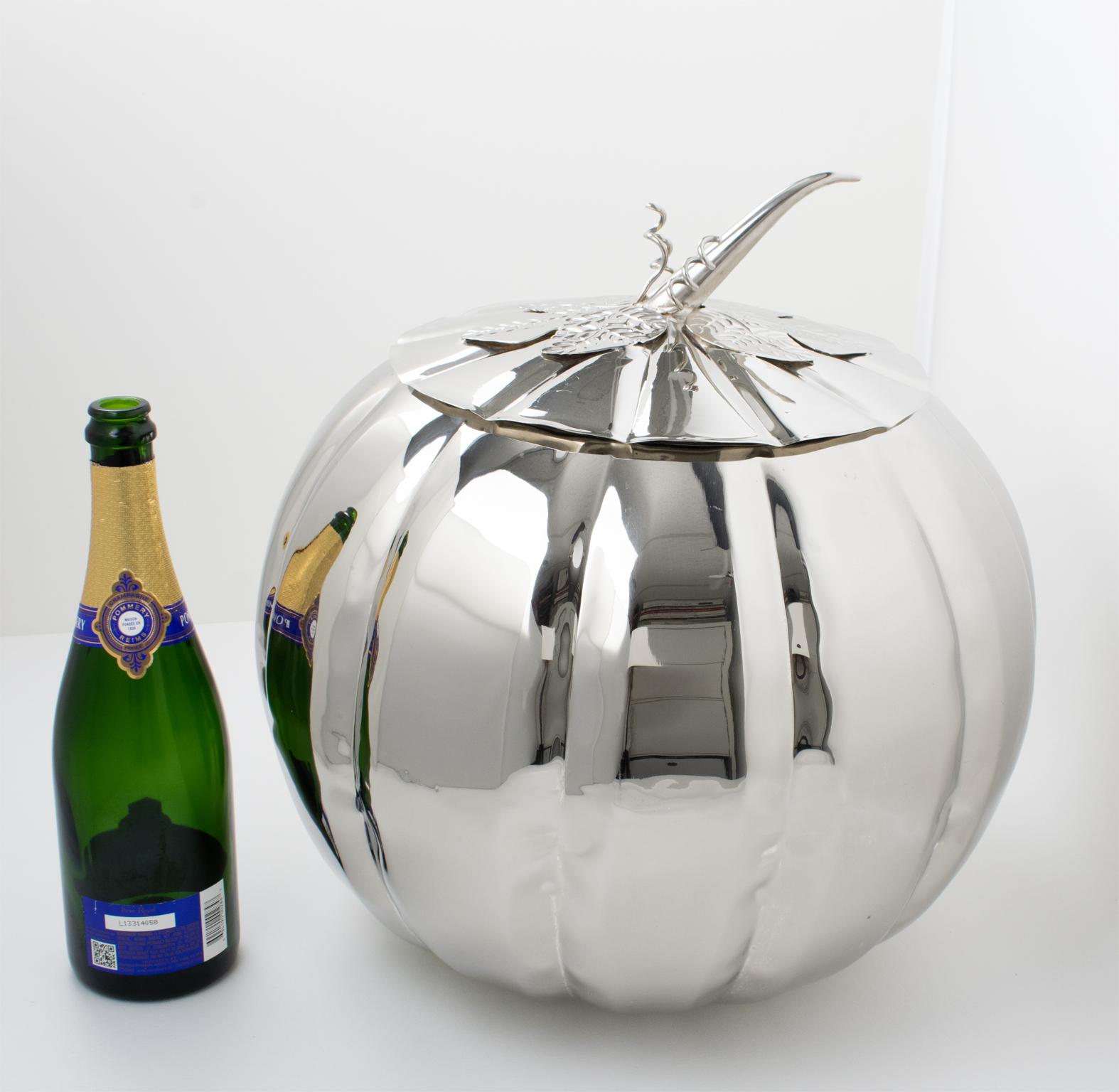 Right on time for The Holidays, impress your guests with this gigantic silver plate punch bowl. The barware serving set included a giant pumpkin-shaped container with a lid and its serving ladle with an organic carved design. Please check carefully