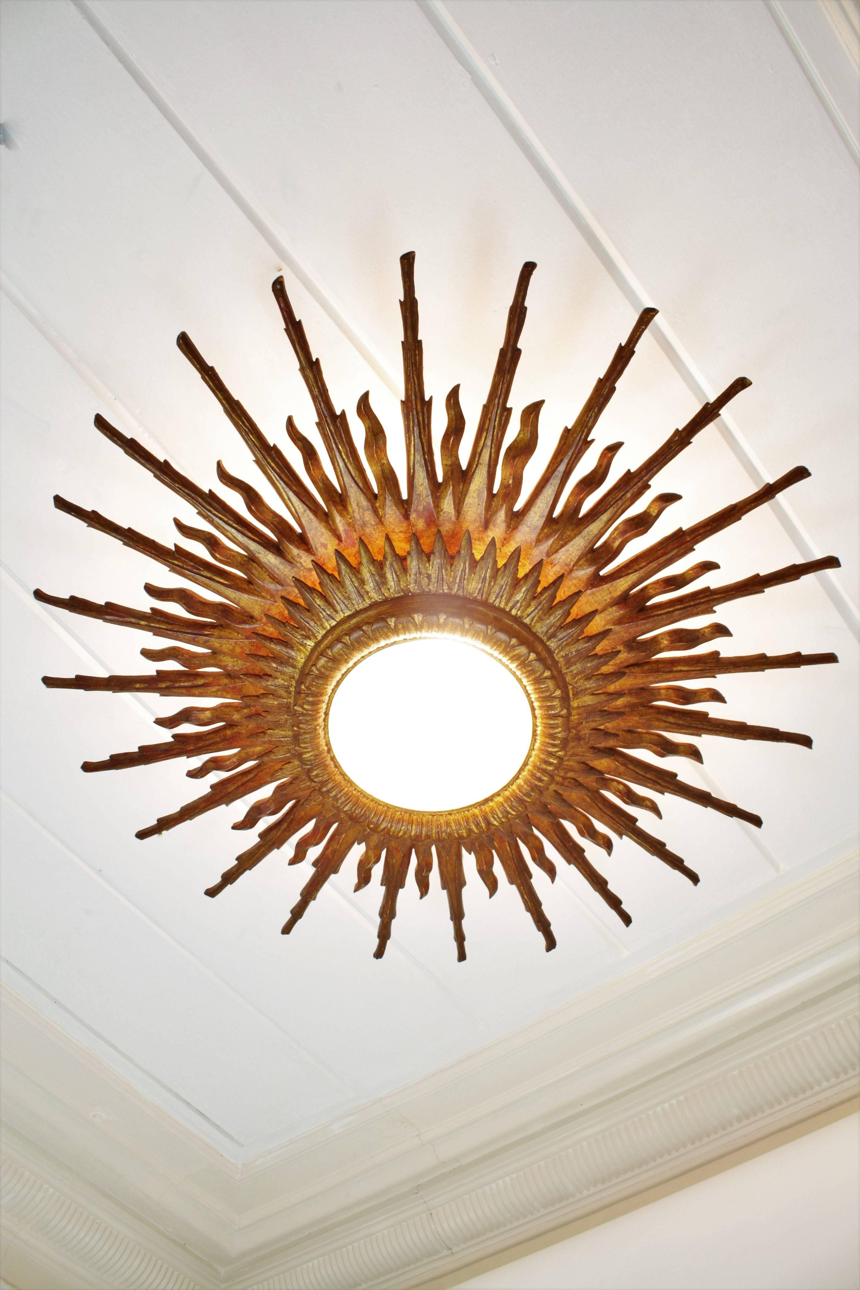 Spanish Giant 1940s Baroque Style Giltwood Sunburst Ceiling Light Fixture or Mirror