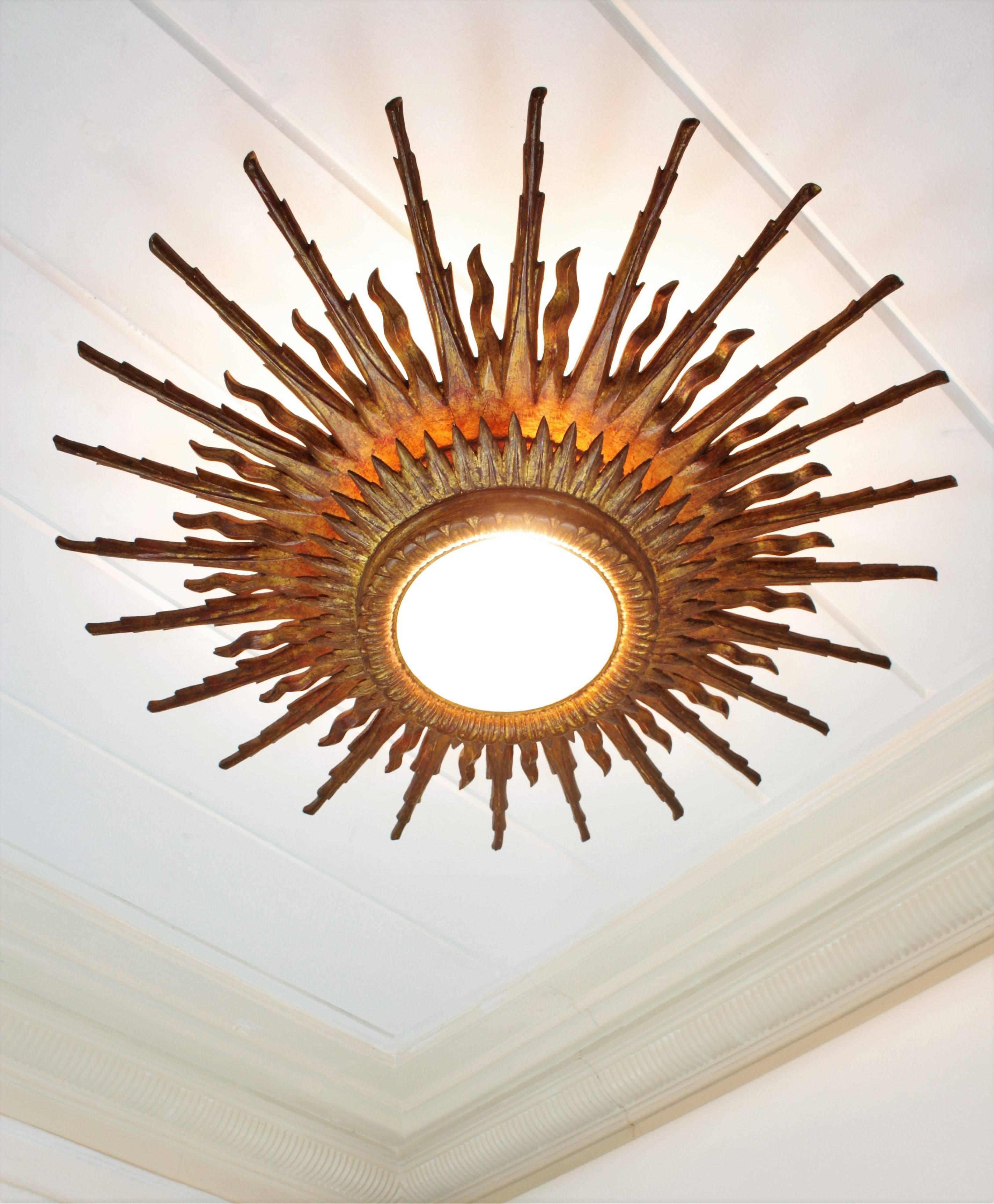 Giant 1940s Baroque Style Giltwood Sunburst Ceiling Light Fixture or Mirror In Excellent Condition In Barcelona, ES