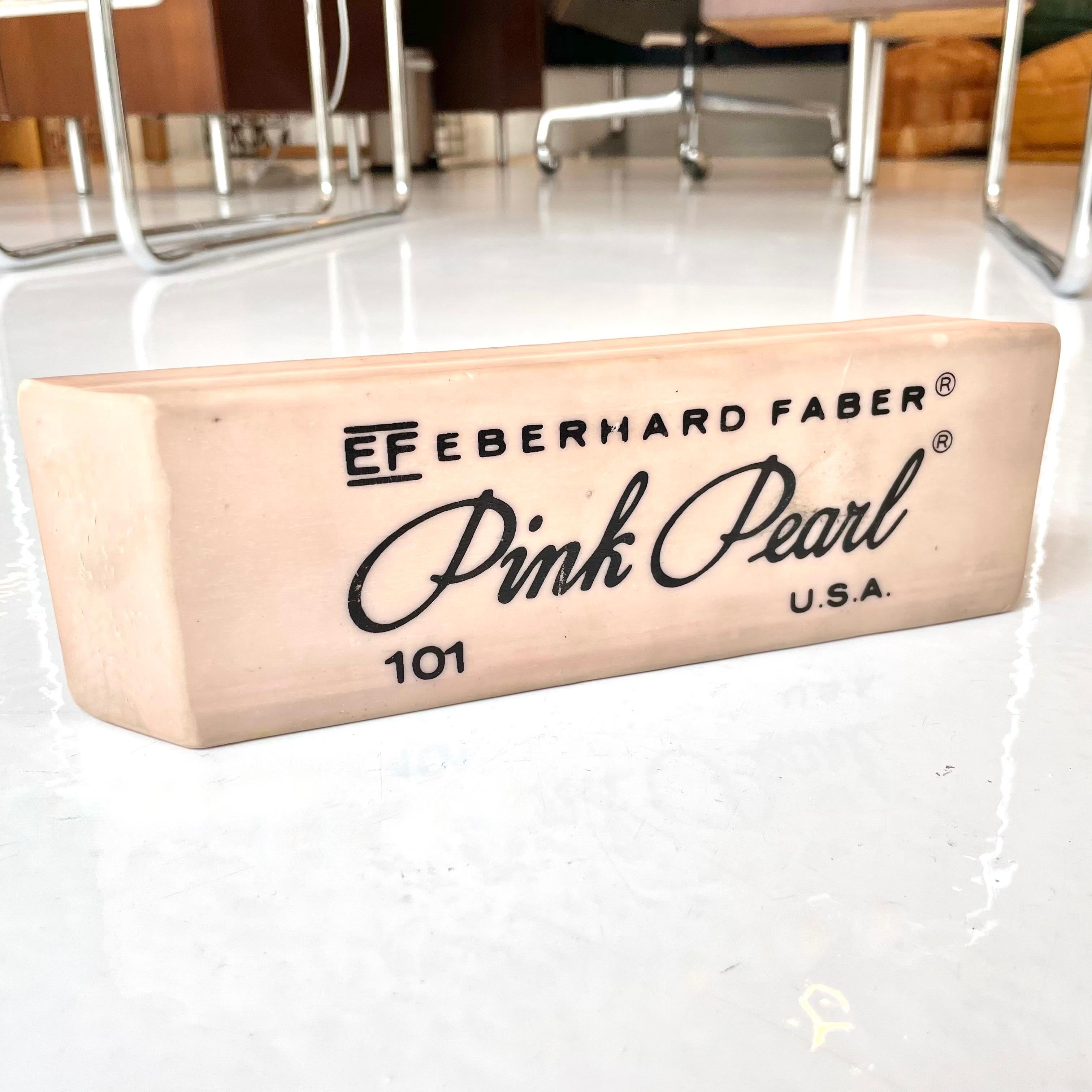 Giant vintage pink pearl eraser. Made in 1984 by Think Big, NYC. Made of an eraser rubber in a classic pink hue. With a ton of character, this sign makes a great desk object or paperweight. Great vintage condition. Super unusual piece of pop art.