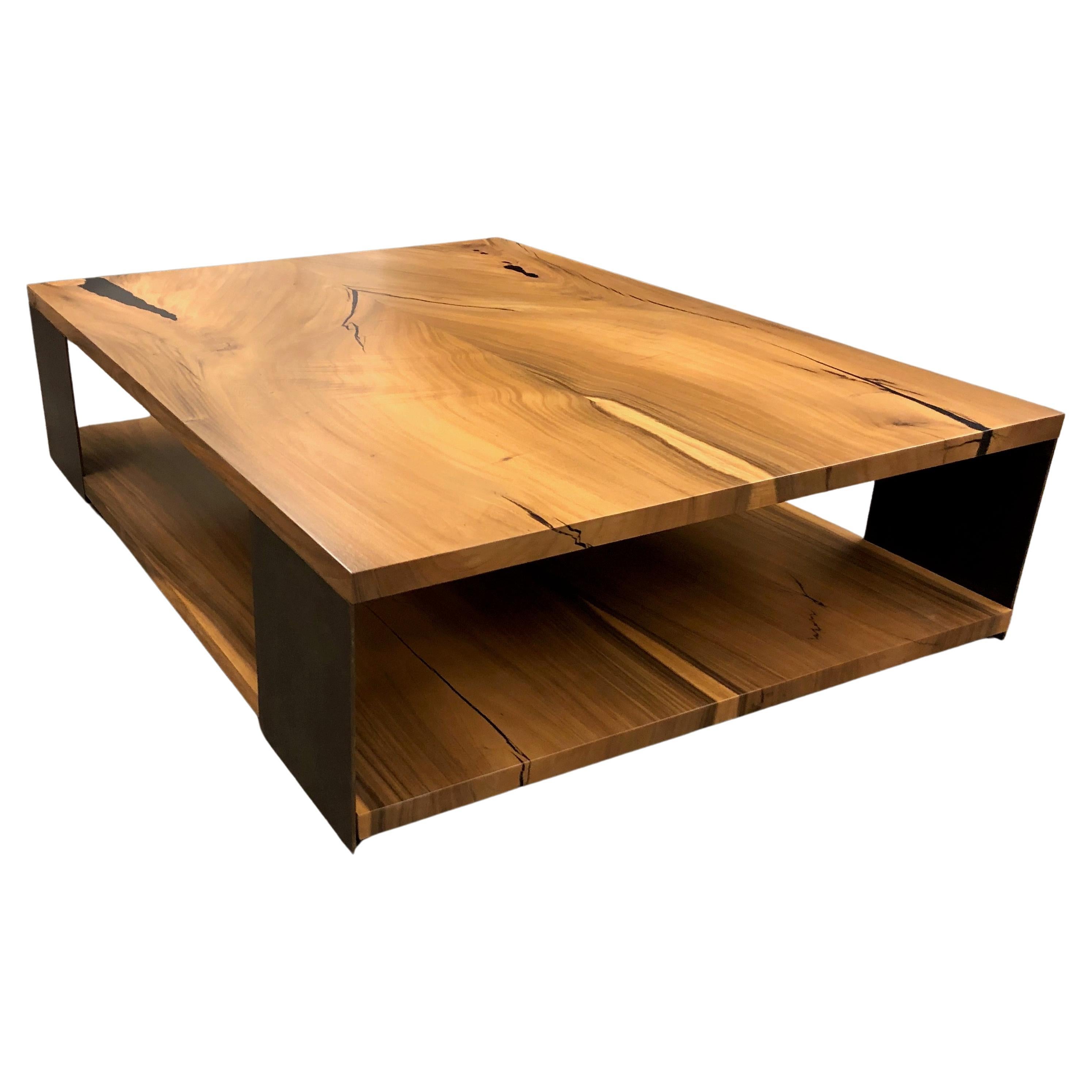Giant two level bookmatched monkeypod coffee table with steel legs For Sale