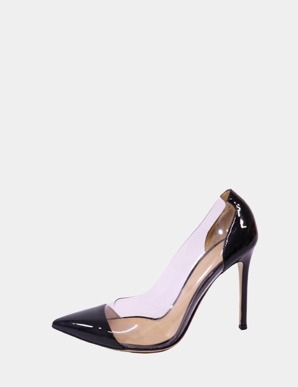 Step into sleek sophistication with these Gianvito Rossi Plexi Pumps, crafted from glossy black patent leather and transparent PVC panels. Known for their modern elegance and barely-there illusion, these stilettos elongate the legs with their