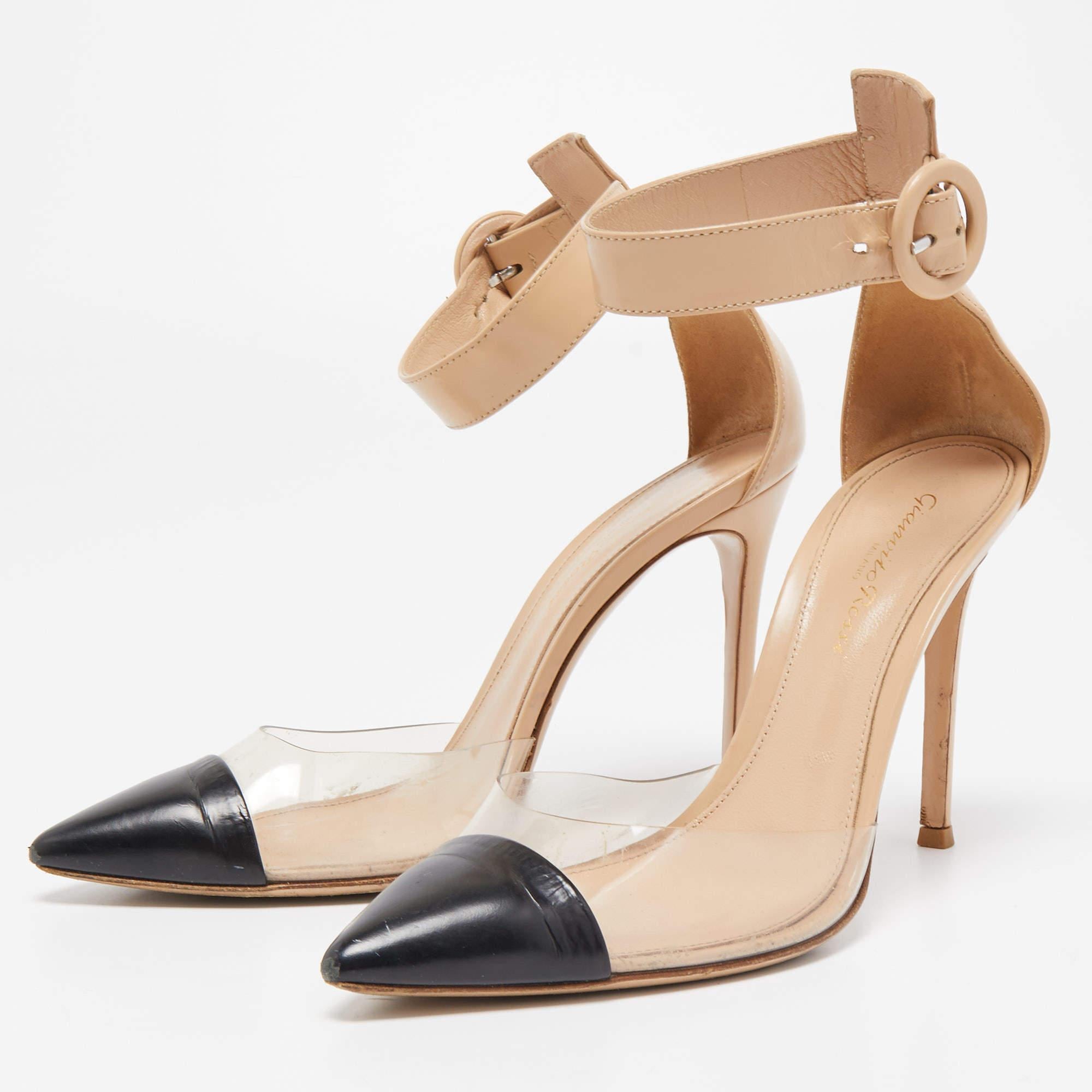 These Gianvito Rossi pumps are artfully crafted in a combination of leather and PVC that lend it a contemporary chic look. Featuring a pointed toe  this pair comes with an ankle strap and 10cm heels. Look your fashionable best by styling them with a