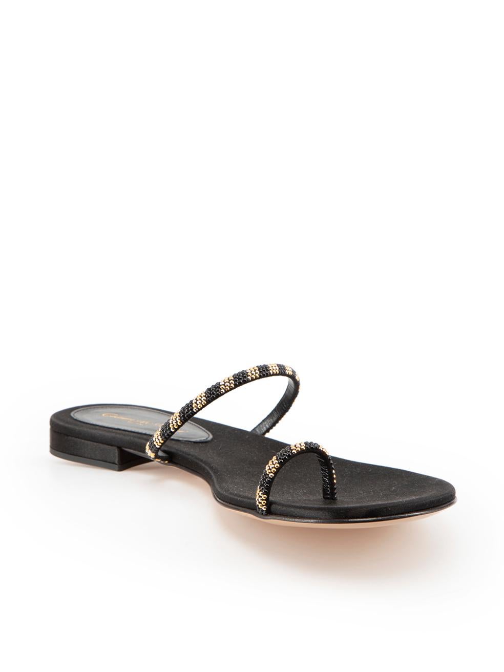 CONDITION is Never worn. No visible wear to sandals is evident on this new Gianvito Rossi designer resale item. Comes in original box.

Details
Black
Embellished suede
Thong sandals
Gold and black embellishment
Strappy
Flat

Made in