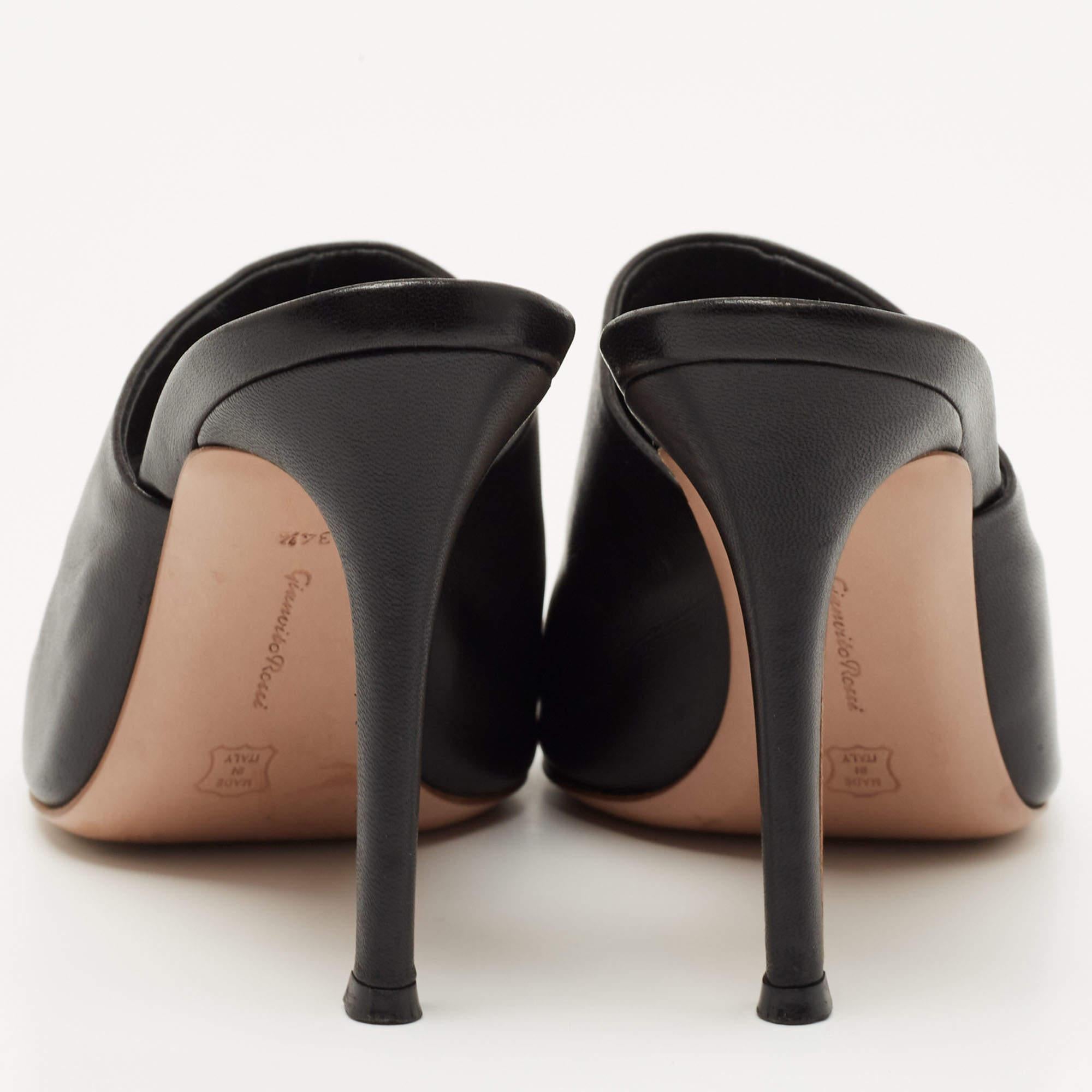 Elevate your look without compromising on comfort when you slip into Gianvito Rossi mules. Made from the finest material, the mules are perfect for any occasion and will leave you feeling confident each time you slip them on.

Includes: Original