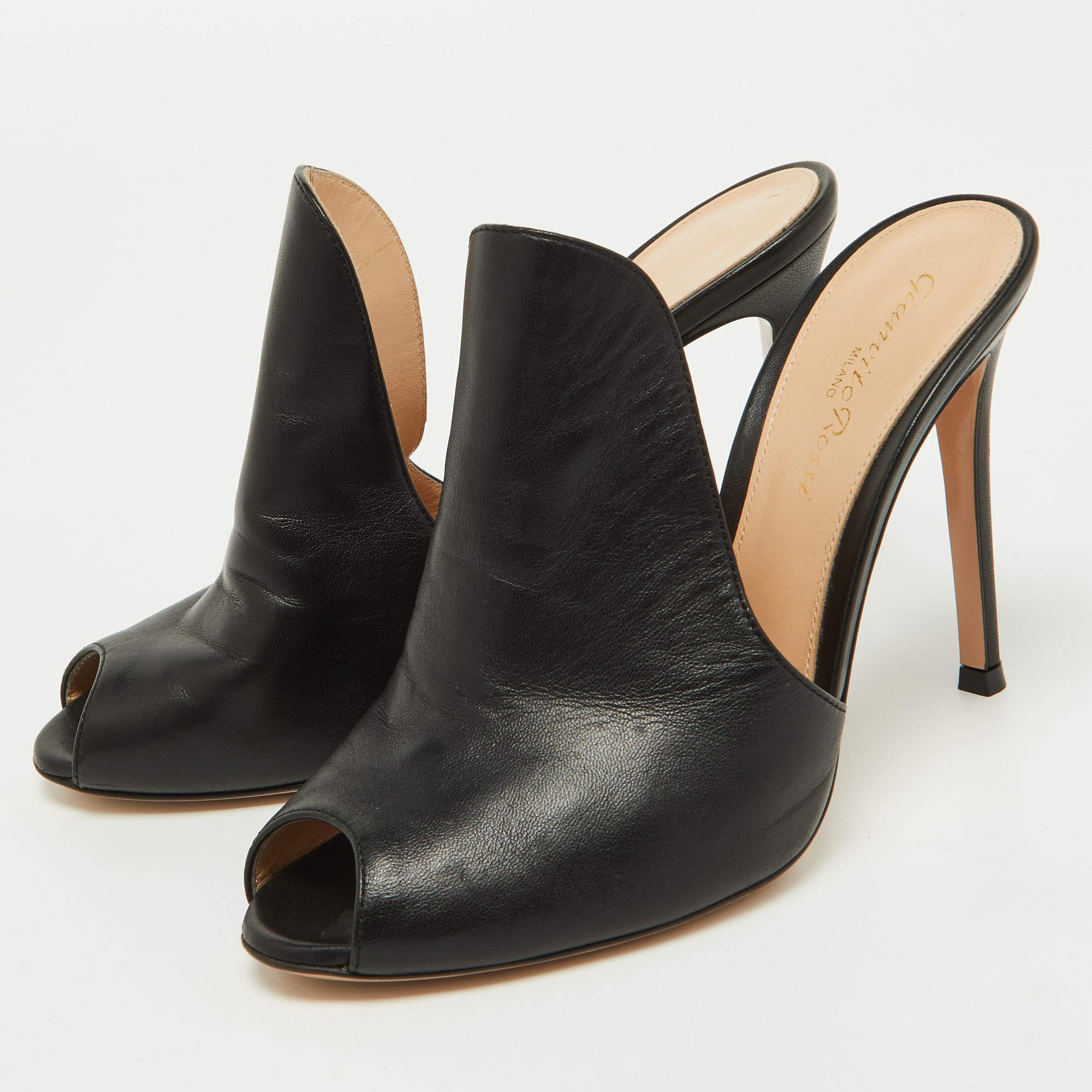 Elevate your look without compromising on comfort when you slip into Gianvito Rossi mules. Made from the finest material  the mules are perfect for any occasion and will leave you feeling confident each time you slip them on.
