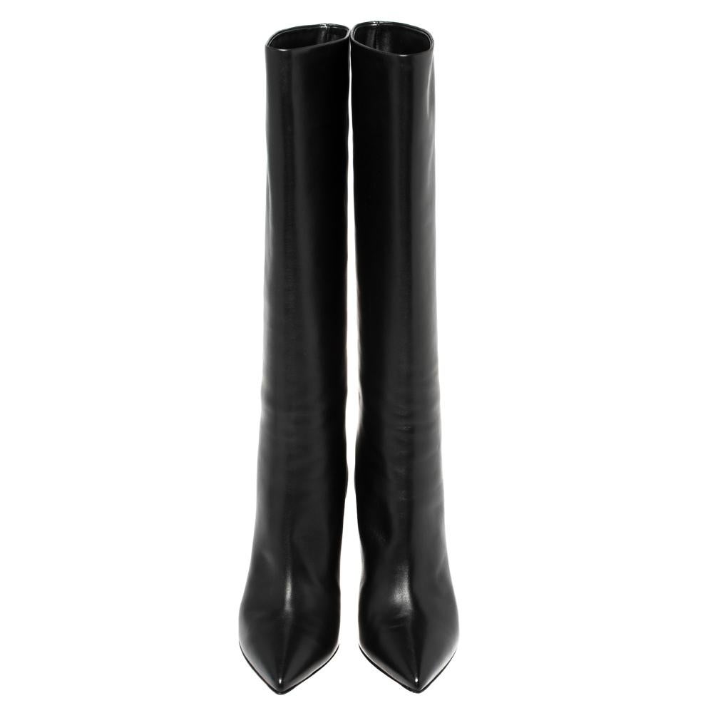 There are numerous ways to style these boots by Gianvito Rossi. Cut to a knee-length design and beautified with pointed toes and slim heels, these black leather boots will easily be one of your favorite pairs.


Includes: Original Dustbag, Original