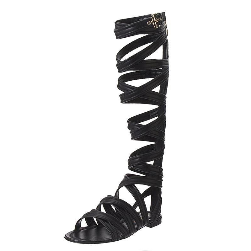 These black gladiator sandals from Gianvito Rossi are very chic and stylish! They are crafted from leather and feature a cage design with multiple straps. They also flaunt buckled straps, back zippers and comfortable leather lined