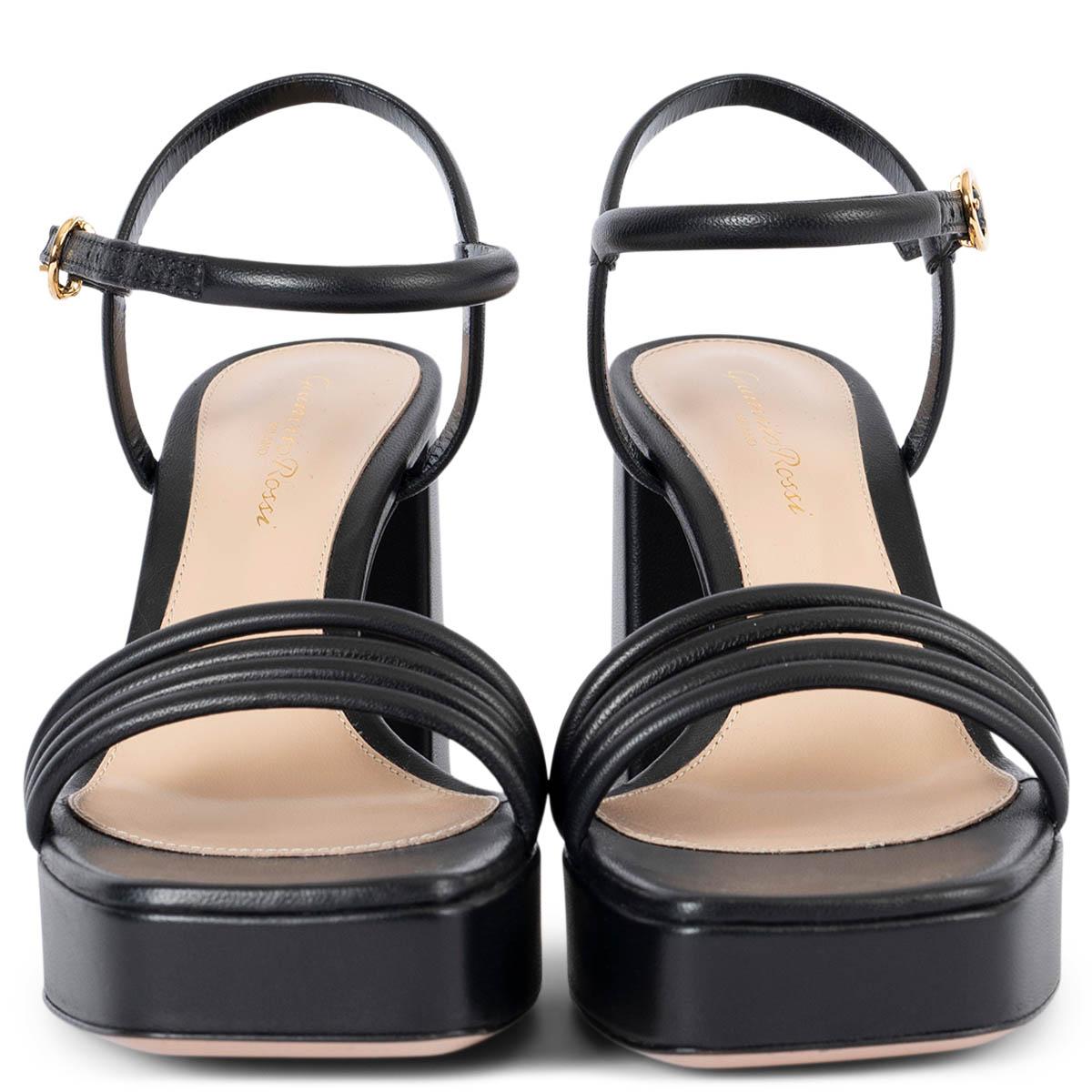 100% authentic Gianvito Rossi Lena 95 platform sandals in black calfskin. They feature piped straps, round metallic buckled ankle straps, and a block heel. Brand new. Come with dust bags. 

Measurements
Imprinted Size	36
Shoe Size	36
Inside