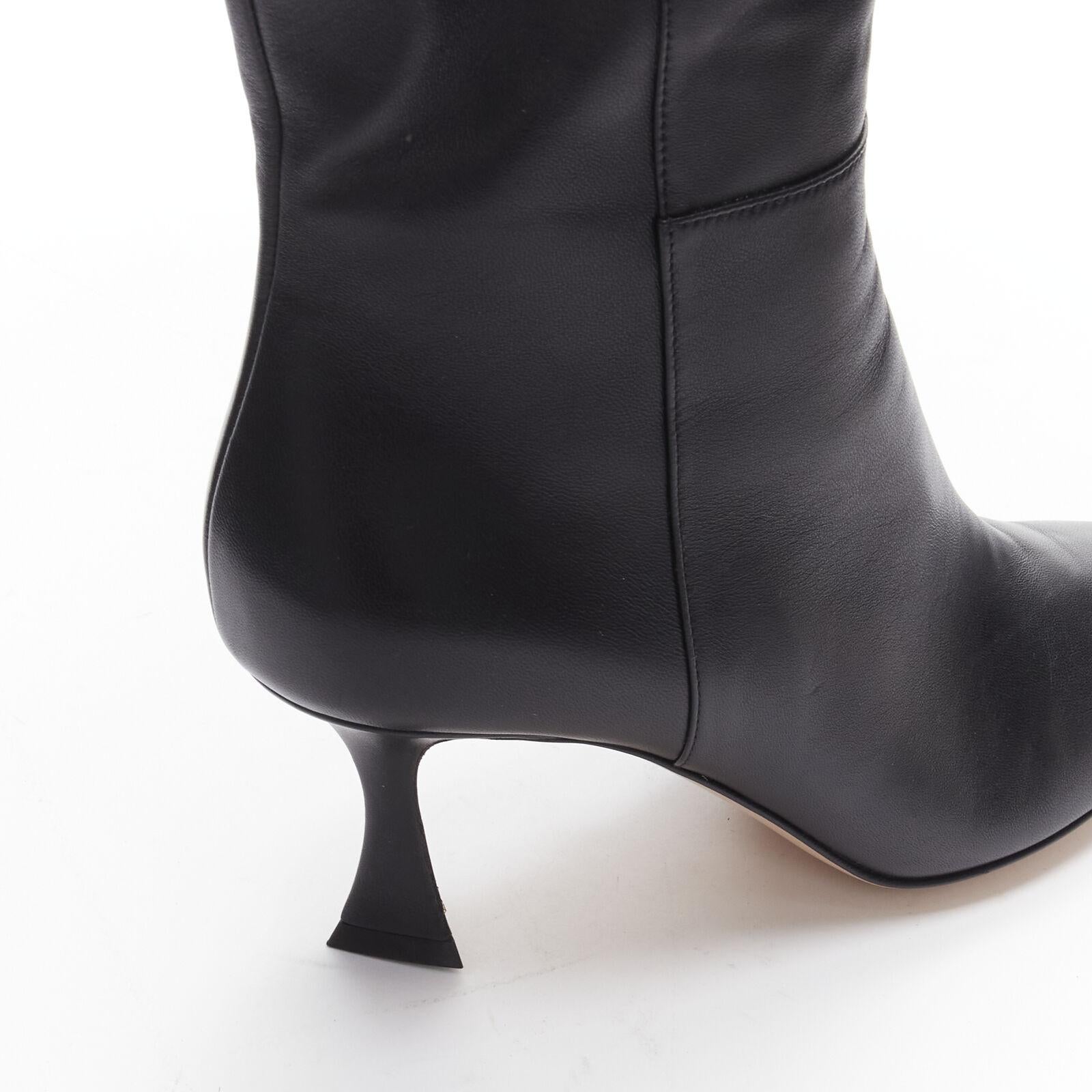 GIANVITO ROSSI black leather point toe spool heeled tall boots EU39 US9
Reference: AAWC/A00129
Brand: Gianvito Rossi
Material: Leather
Color: Black
Pattern: Solid
Closure: Zip
Lining: Leather
Extra Details: Leather panels. Logo zips at the