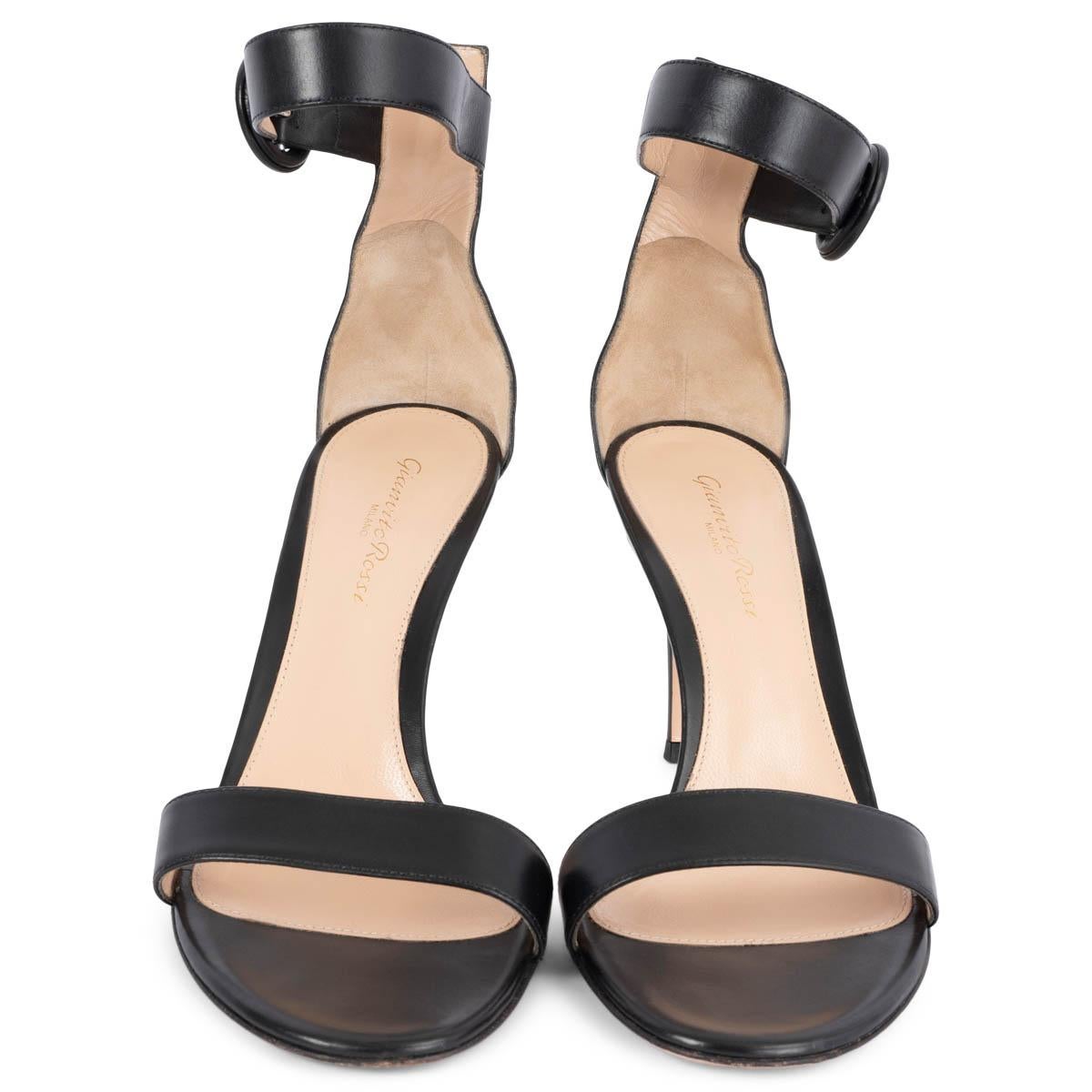 100% authentic Gianvito Rossi 85 Portofino sandals in black calfskin. They have buckled ankle straps stiletto heels. Have been worn and are in excellent condition. 

Measurements
Imprinted Size	37.5
Shoe Size	37.5
Inside Sole	24.5cm