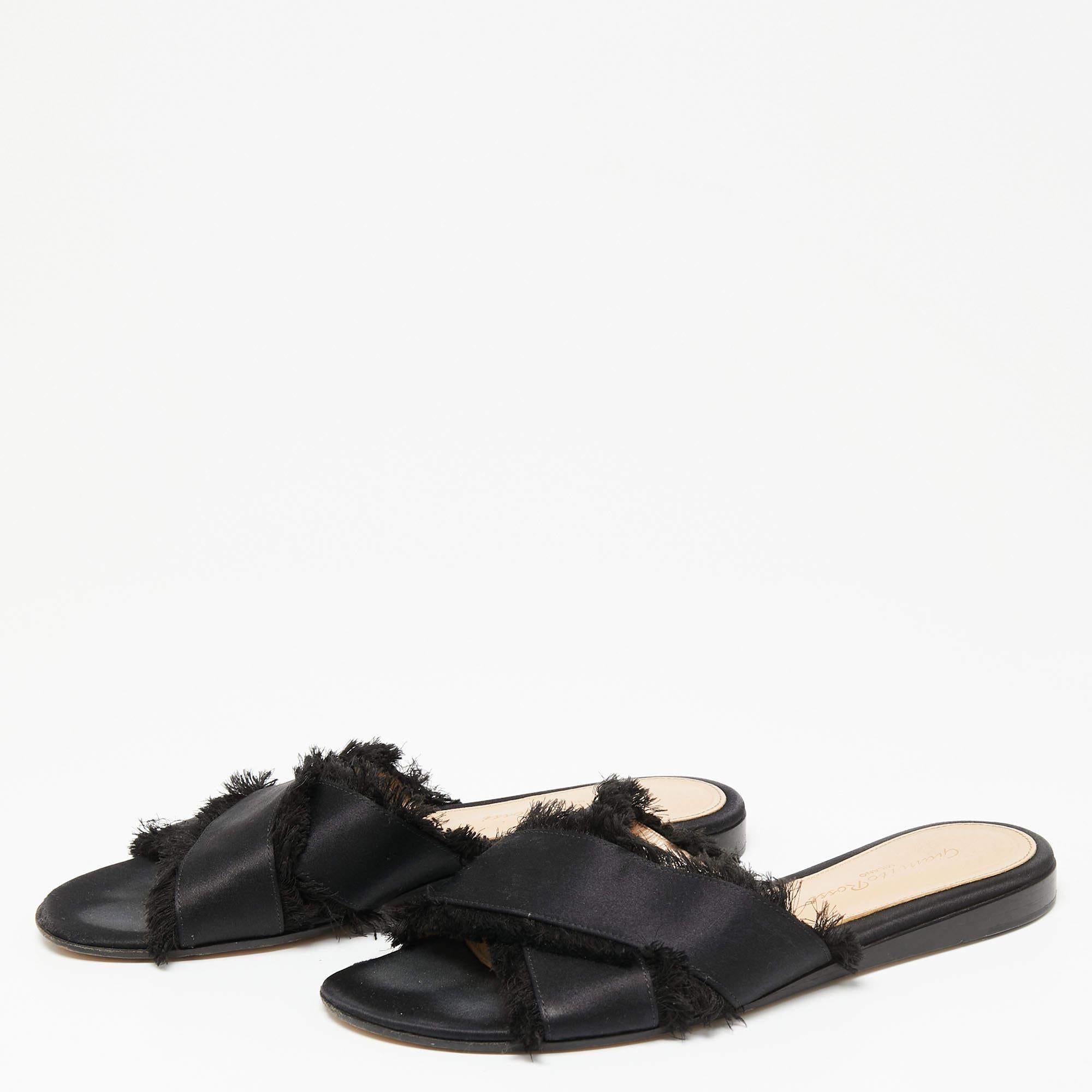 Bring comfort and luxury to your closet with these Barth flat slides from Gianvito Rossi. Crafted using black satin, they showcase a crisscross strap on the upper and a slip-on style. These slides are a super-comfy pair to own. 