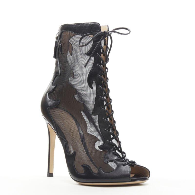 GIANVITO ROSSI black sheer flame leather peep toe lace up ankle bootie EU38
Reference: LNKO/A01787
Brand: Gianvito Rossi
Model: Sheer bootie
Material: Leather
Color: Black
Pattern: Solid
Closure: Zip
Lining: Leather
Extra Details: Flame cut out.