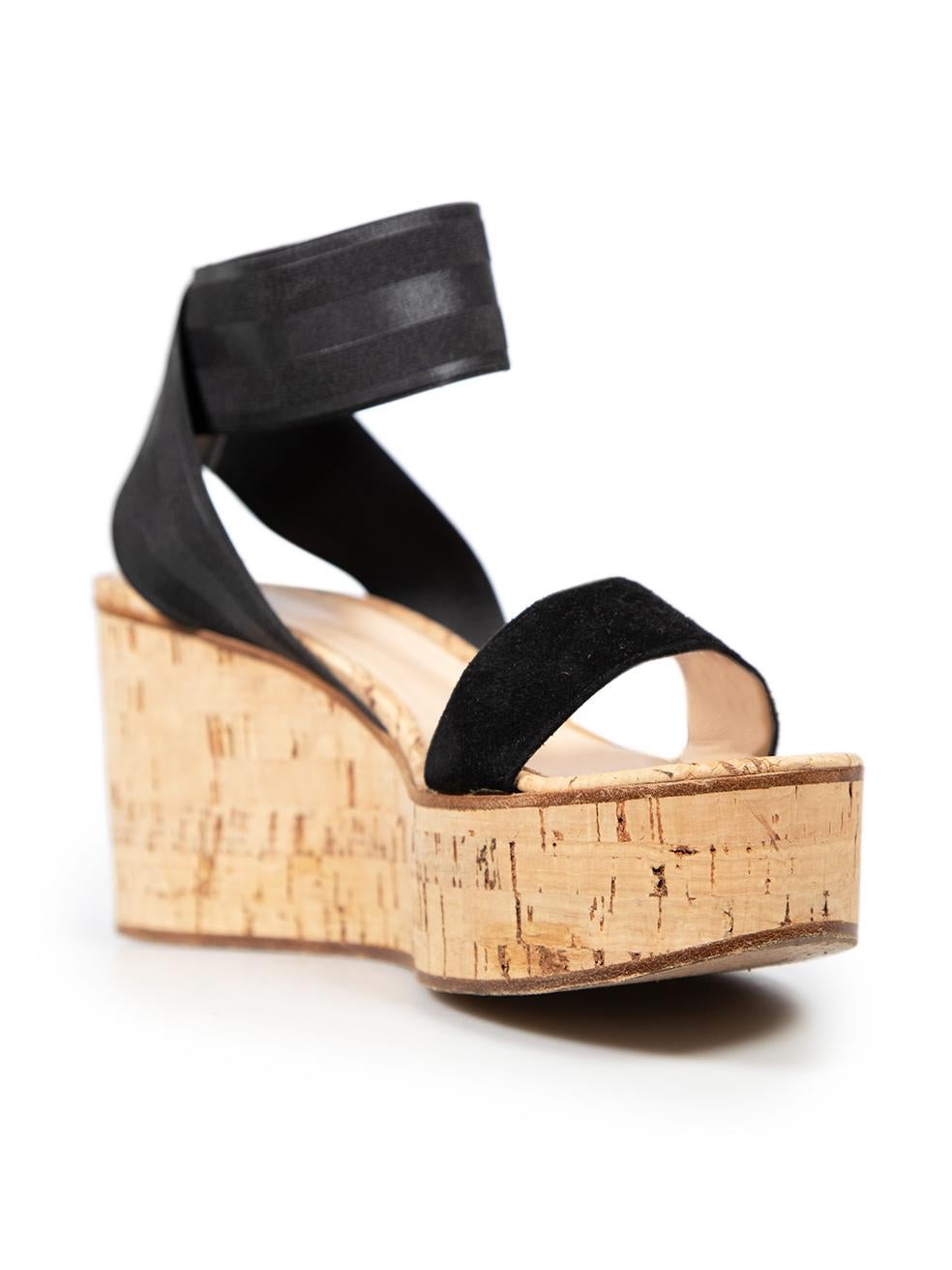CONDITION is Very good . Minimal wear to the shoes is evident, there is discolouration on the insoles and underneath the elastic ankle strap of this used Gianvito Rossi designer resale item.
  
  
  
  Details
  
  
  Black
  
  Cloth
  
  Wedge