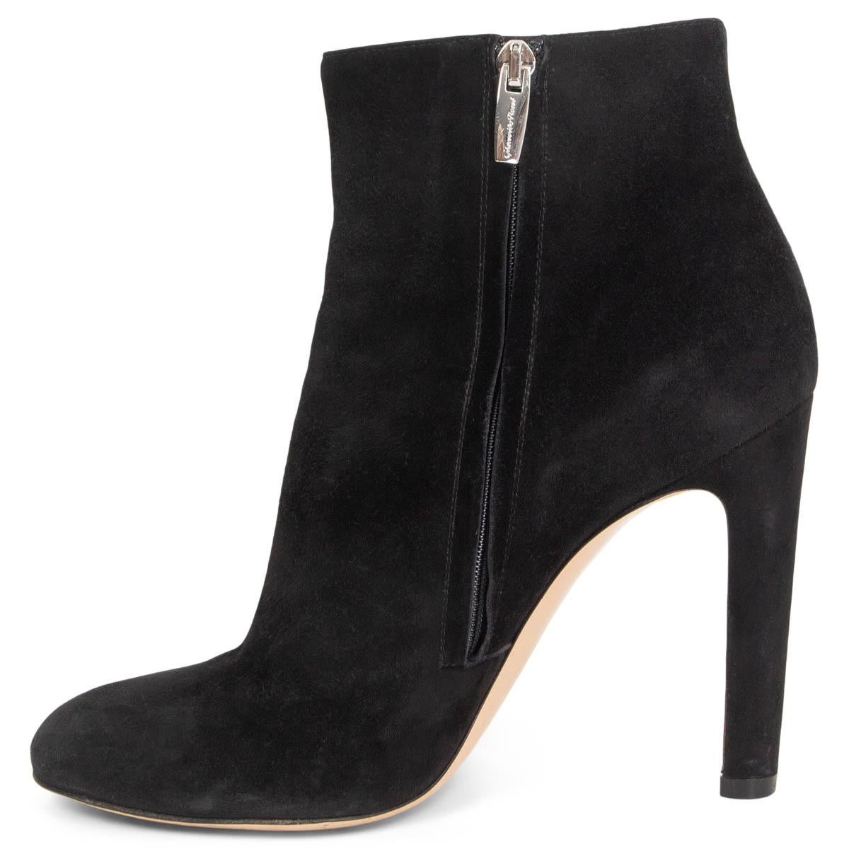 100% authentic Gianvito Rossi round-toe ankle booties in black suede. Open with a zipper on the inside. Have been worn with some soft press marks on the heel. Overall in very good condition. 

Measurements
Imprinted Size	39.5
Shoe Size	39.5
Inside