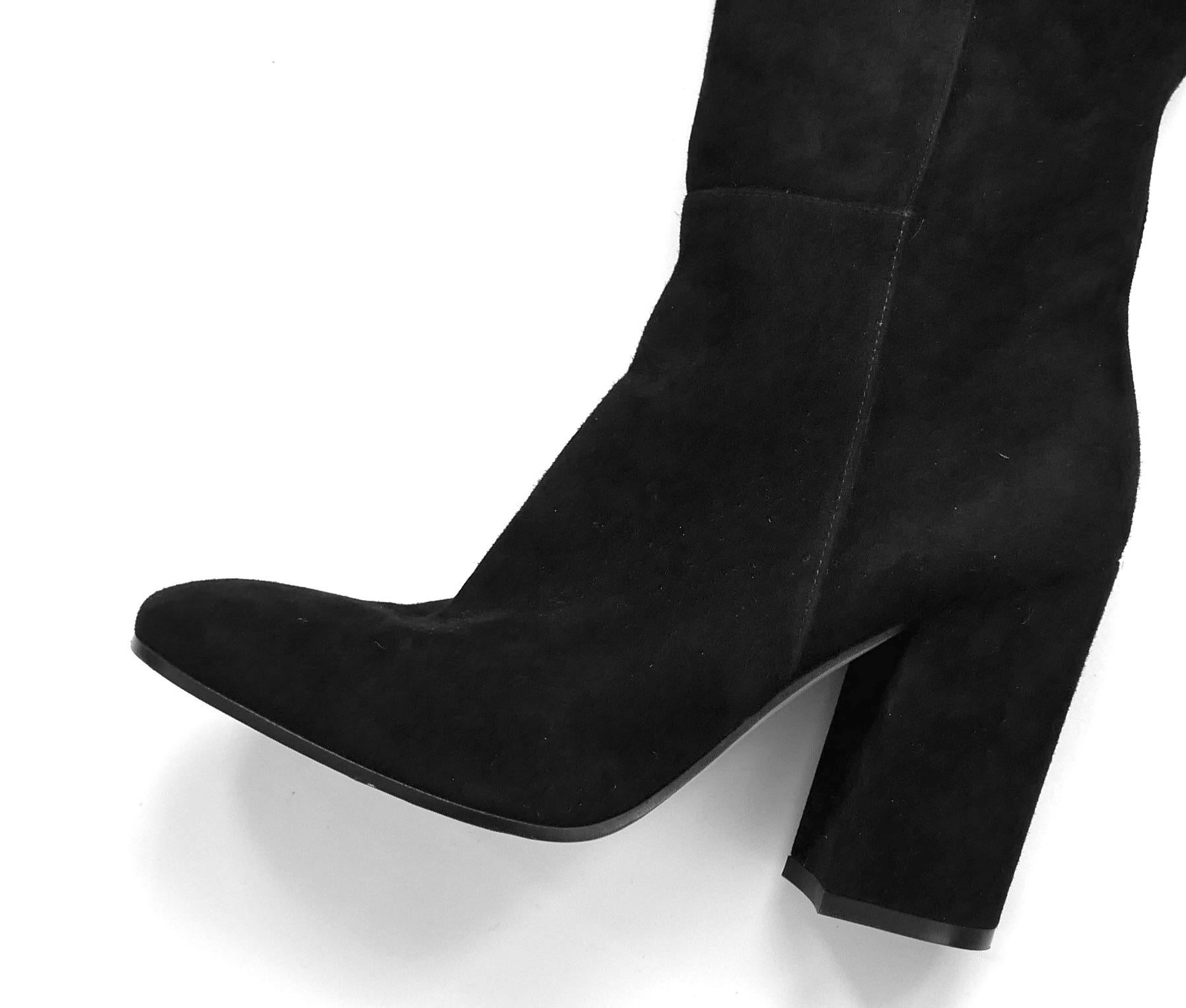 Fabulous Gianvito Rossi over the knee boots - bought for £1250 and worn once with dustbag. Made from soft black suede with silver tone fob inner side zips, gaiter tops, chunky heels and rounded toes. Lined in leather.
Size 36.5/Uk3.5 Measure approx