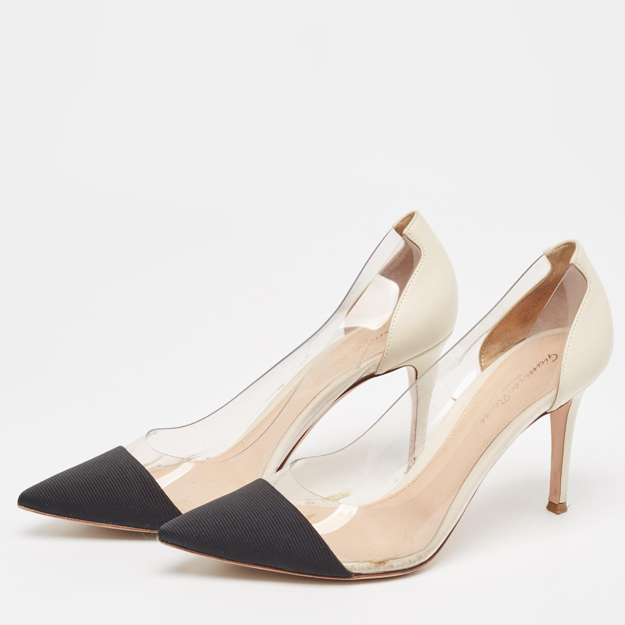 The black and white shade of this pair of Gianvito Rossi pumps makes it pleasing and appealing. Created from PVC and leather these shoes are articulately designed and flaunt pointed toes The 9cm heels of this pair will offer you chic and bold steps.
