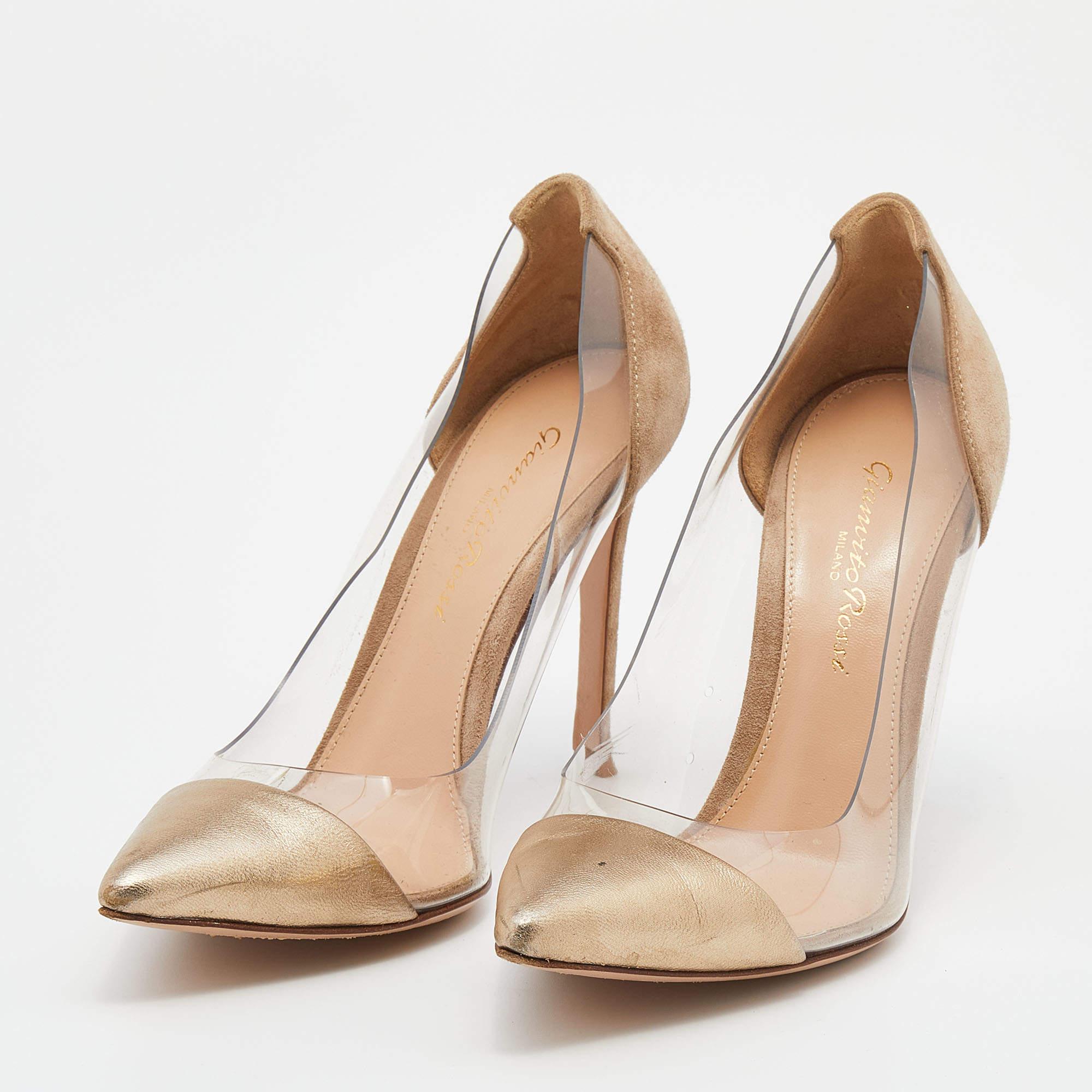 The Plexi pump is one of Gianvito Rossi's most iconic designs. The shoe is a pointed toe pump made from PVC and other durable materials in grand shades. This elegant pair is made from gold leather, brown suede as well as clear PVC and lifted by slim
