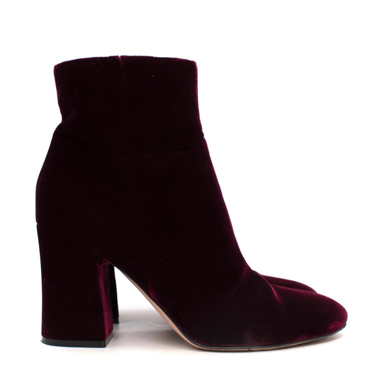 Gianvito Rossi Burgundy Velvet Heeled Ankle Boots
 

 - Deep burgundy velvet bootie with round toe, and mid-height block heel
 - Concealed side zip and smooth leather sole 
 

 Materials 
 100% Velvet 
 100% Leather 
 

 Made in Italy 
 

 PLEASE