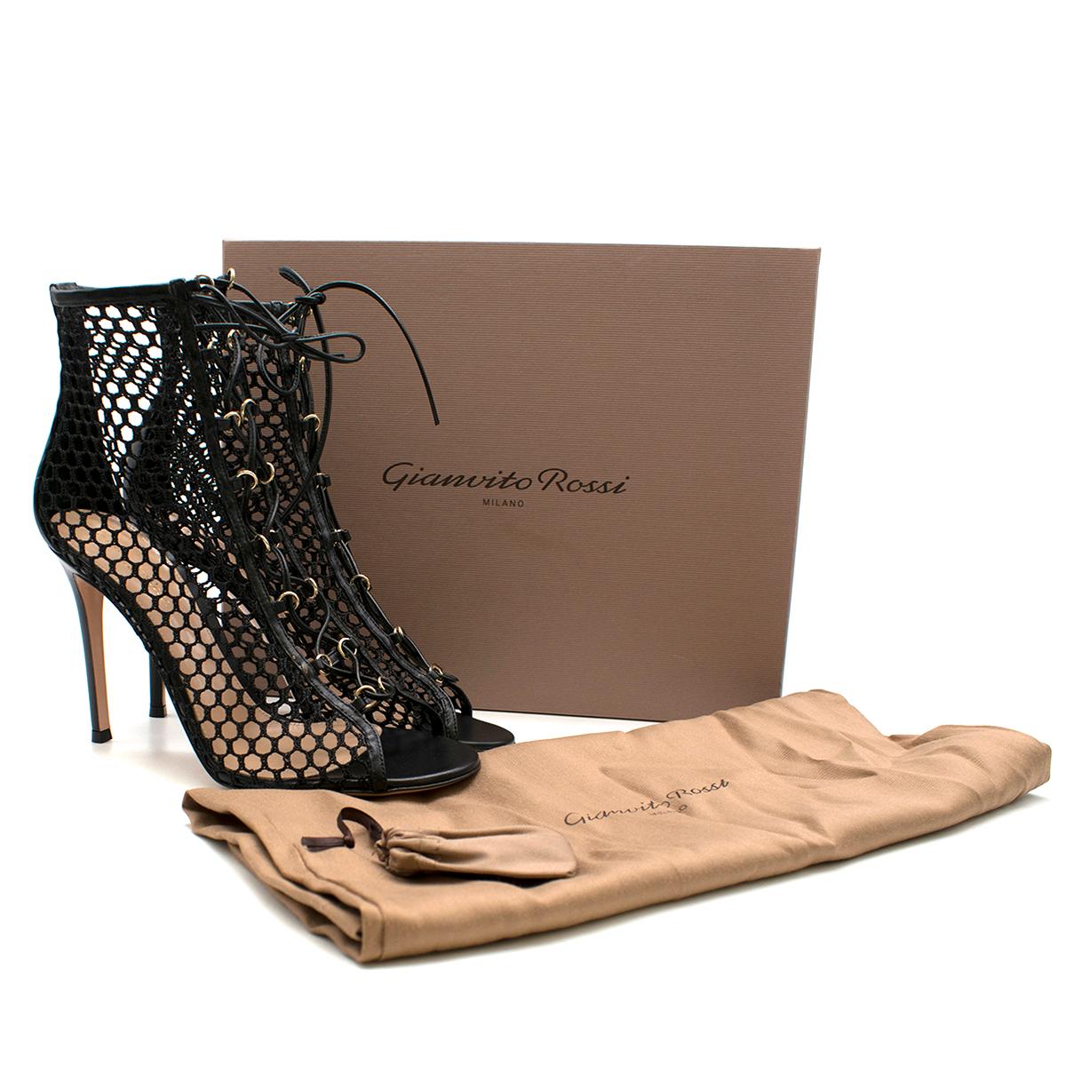 Gianvito Rossi Crochet Lace Up Peep

- Black peep heels
- Fishnet crochet
- Front lace-up
- 105mm stiletto heel
- Open toe
- This item comes with the original dust bag and shoe box.

Please note, these items are pre-owned and may show some signs of