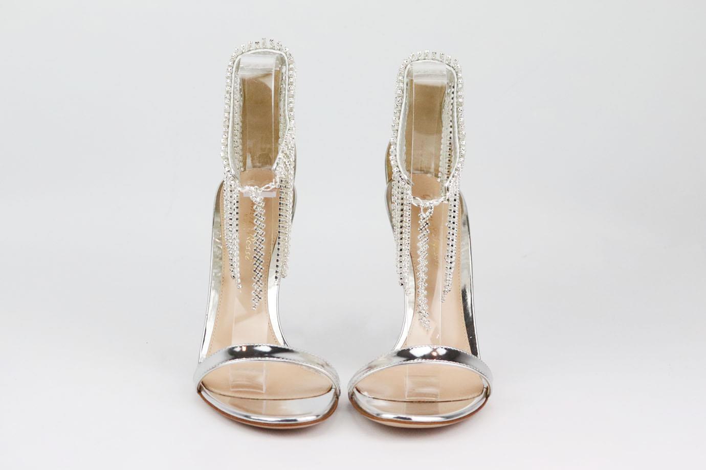 These sandals by Gianvito Rossi have been made in Italy from metallic leather trimmed with swishy crystal fringing around the ankle strap. Heel measures approximately 83mm/ 3.5 inches. Metallic leather. Lobster clasp fastening at front. Does not