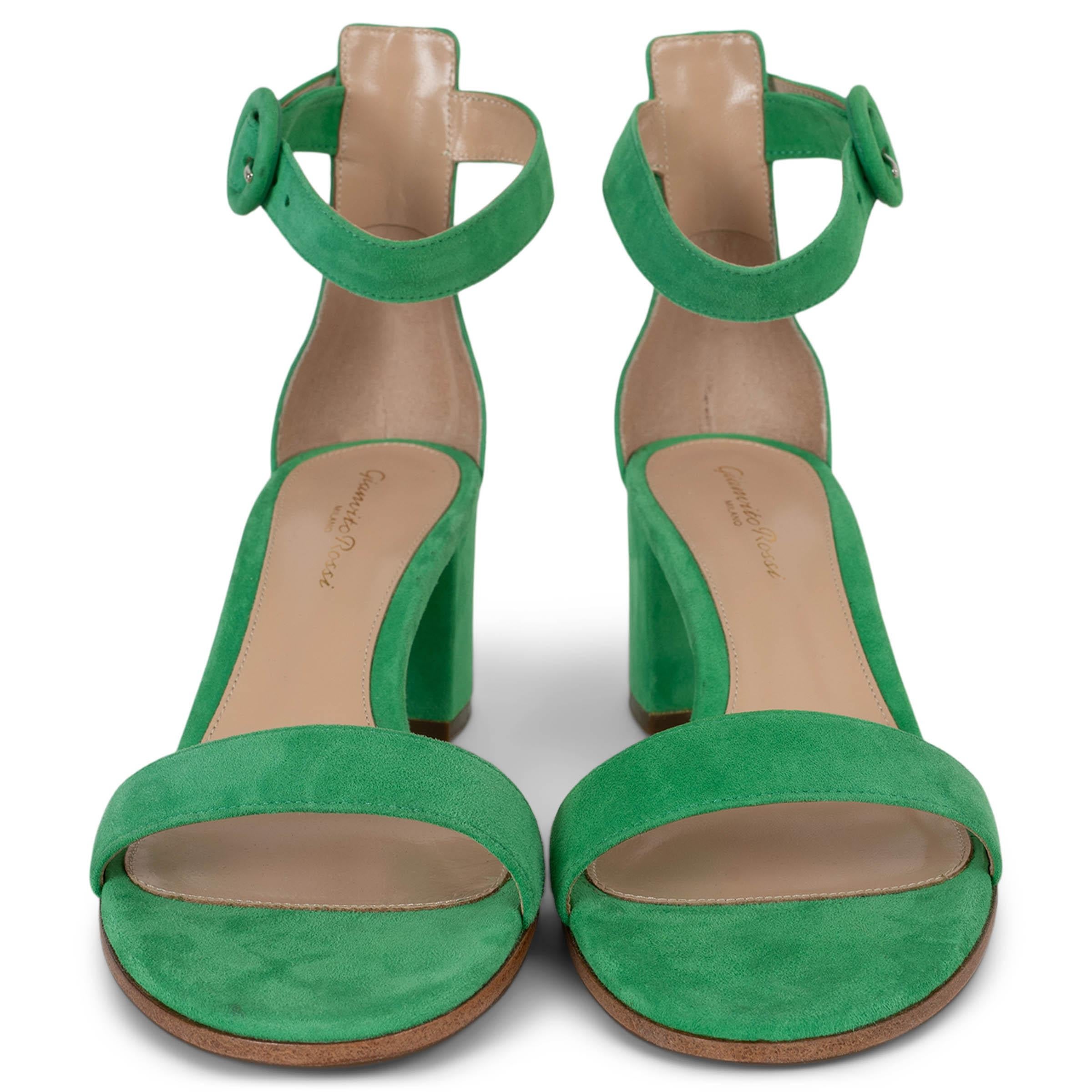 These 100% authentic Aquazzura Versilia 60 sandals in bright green suede are a bold and sophisticated addition to any wardrobe. Featuring a delicate ankle strap with a small buckle, they offer a secure fit while maintaining an elegant silhouette.