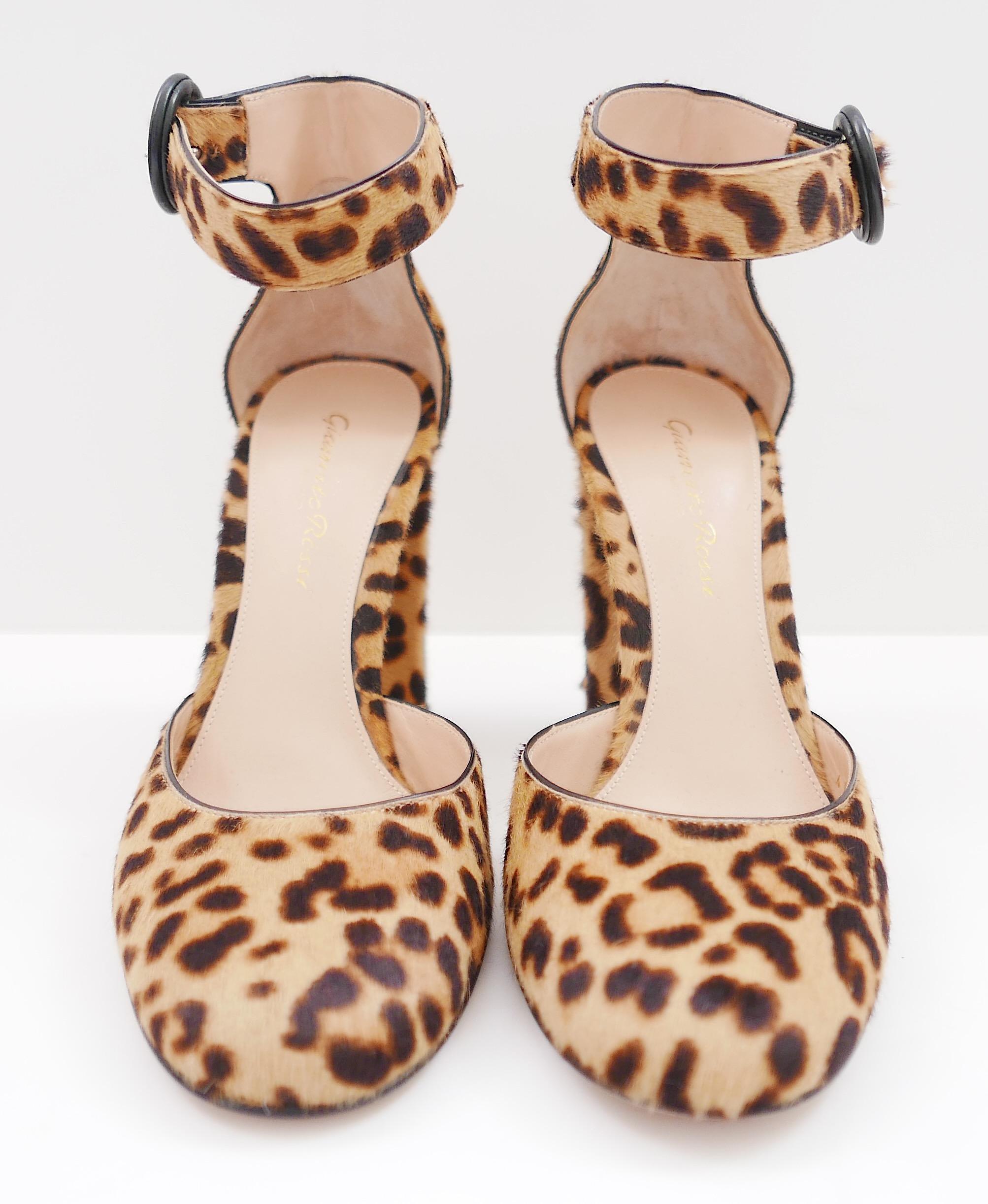 Cute and chic Gianvito Rossi leopard calf hair ankle strap pumps - bought for £700 and unworn with dustbag. Made from calf hair with black patent buckles, they have rounded toes and chunky heels. Size 36. Measure approx 9.25” heel to toe and heel 4”.
