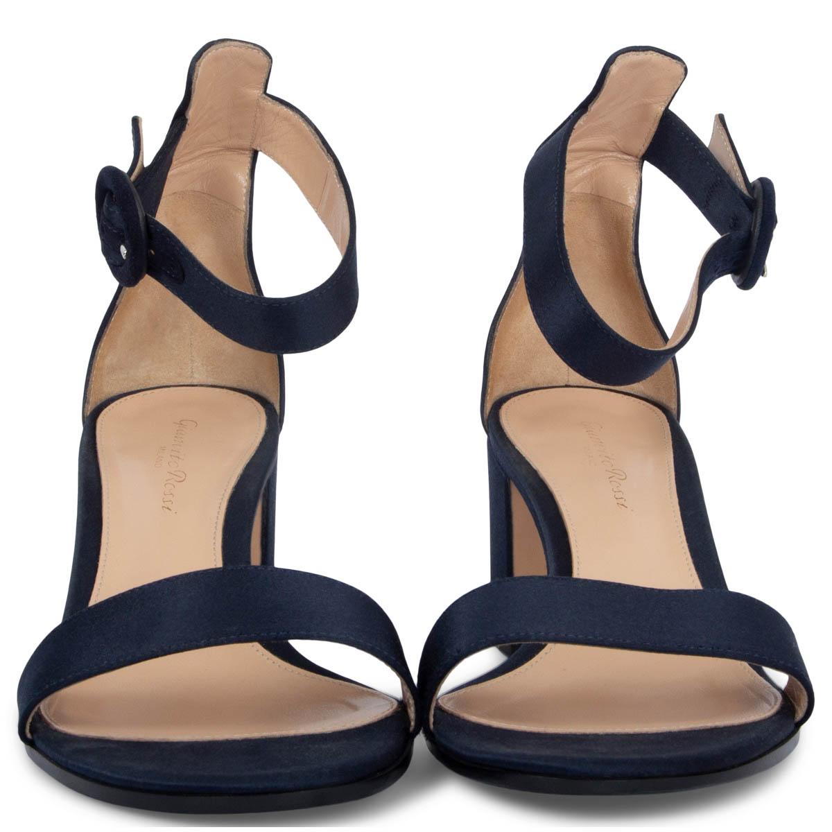 100% authentic Gianvito Rossi Versilia 60 sandals in navy blue satin with a single band across the toe and an ankle strap. Have been worn once or twice and are in excellent condition. 

Measurements
Imprinted Size	38
Shoe Size	38
Inside Sole	25cm
