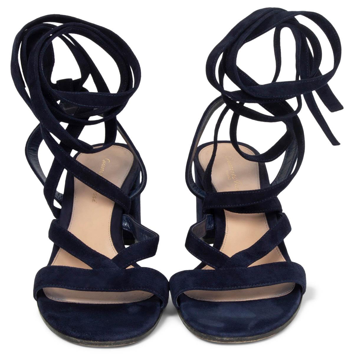 100% authentic Gianvito Rossi Janis 60 lace-up sandals in navy blue suede with block heel. Have been worn and are in excellent condition. (Show heavy wear on sole). Come with dust bag. 

Measurements
Imprinted Size	38
Shoe Size	38
Inside Sole	25cm