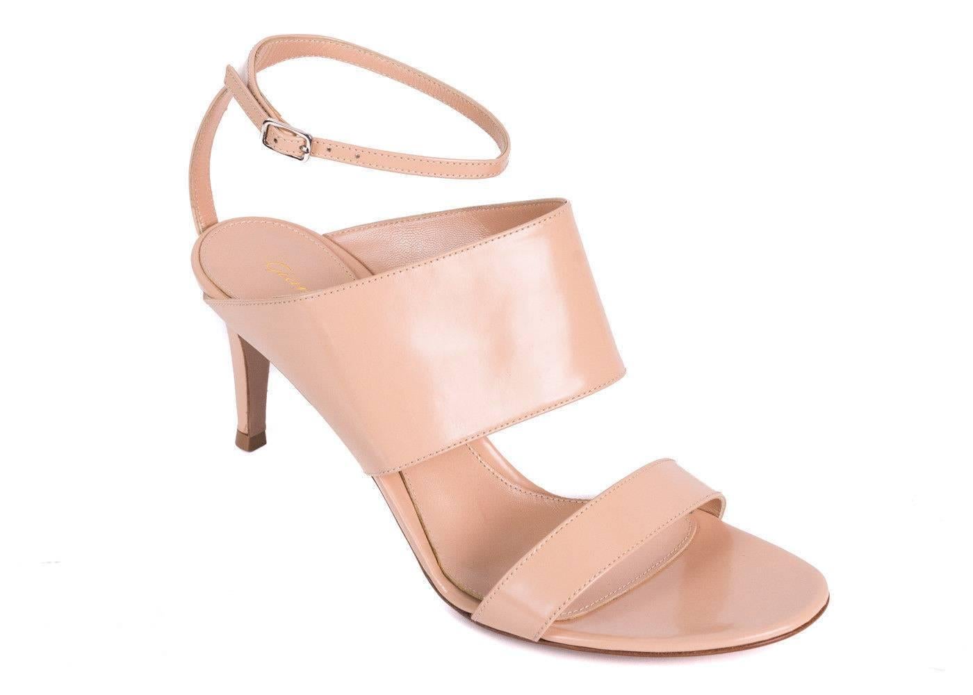 Gianvito Rossi's Nude Mules are the Spring/Summer necessity. This polished leather heels features a fine buckled ankle strap, 2.75