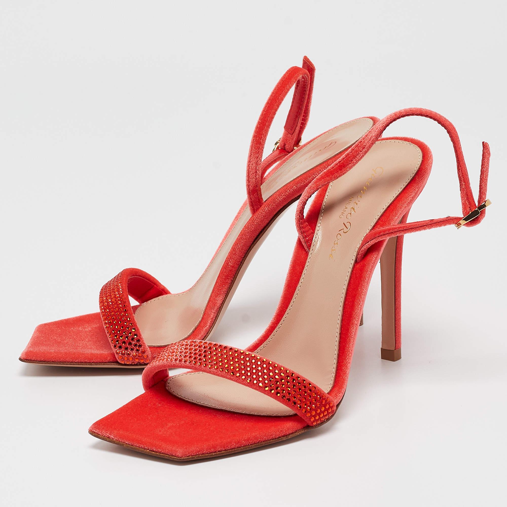 In orange leather the Gianvito Rossi Britney sandals exude confident charm. Delicate straps gracefully embrace the foot while a sturdy heel provides stability and style. With impeccable craftsmanship and timeless design these sandals effortlessly