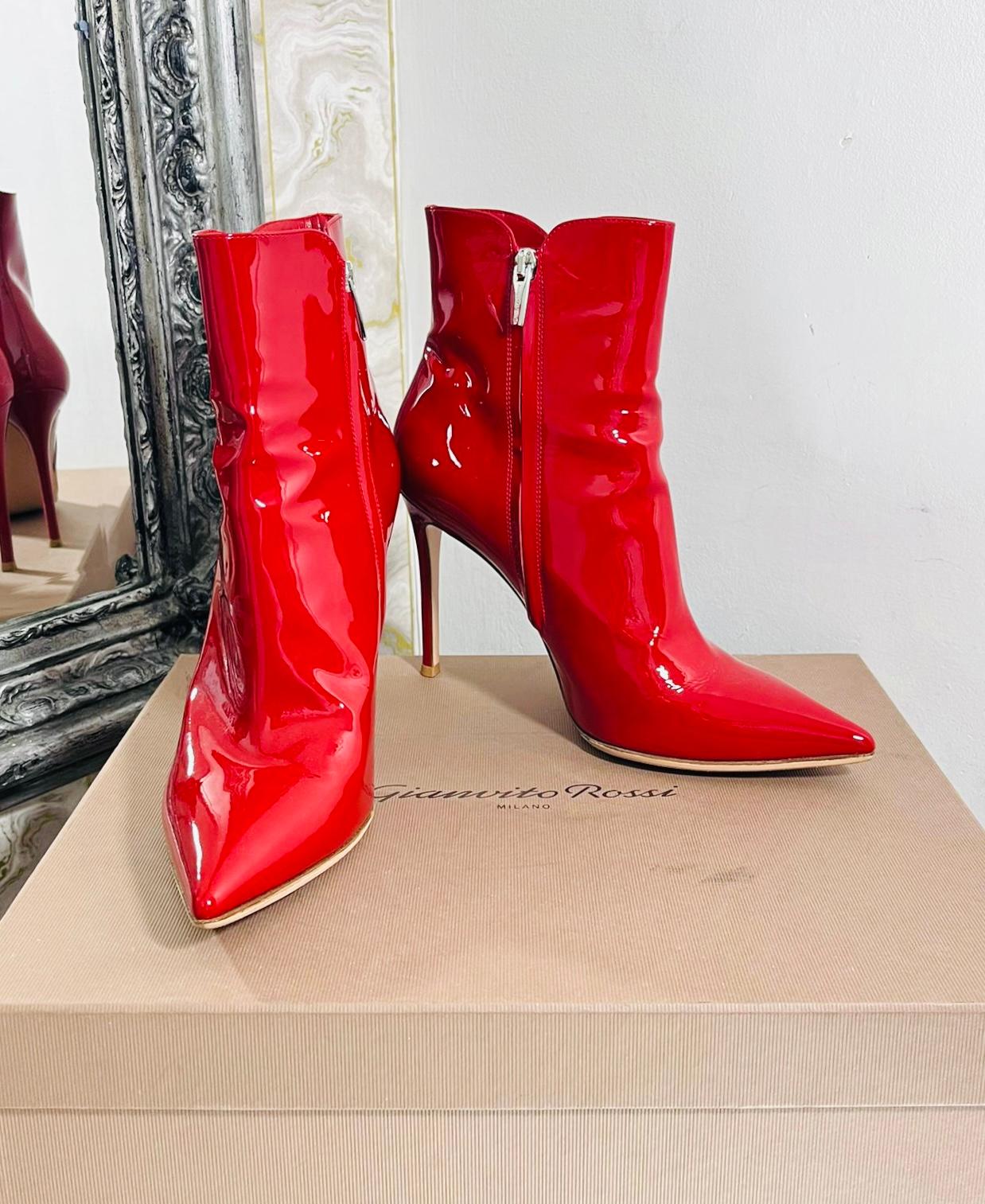 Gianvito Rossi Patent Leather Ankle Boots

Glossy red boots designed with pointed toe and stiletto heel.

Featuring zip fastening to the side, leather lining and soles.

Size – 40.5

Condition – Very Good

Composition – Patent Leather

Comes with –