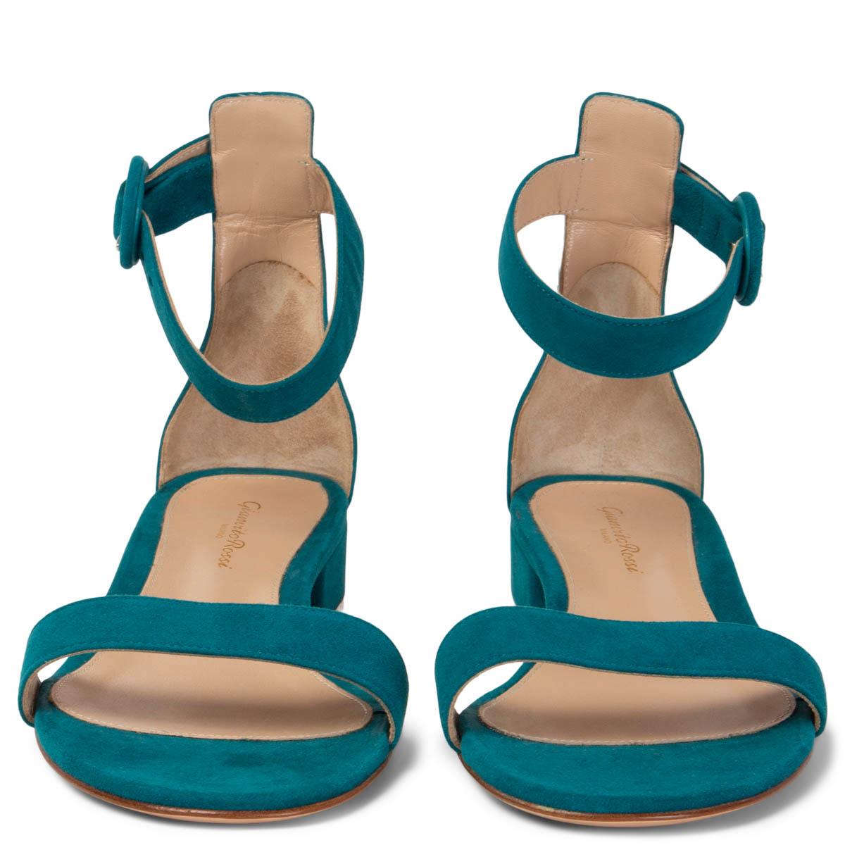 100% authentic Gianvito Rossi Versilia 20 ankle strap sandals in petrol blue suede with block heel. Brand new.

Measurements
Imprinted Size	38
Shoe Size	38
Inside Sole	25cm (9.8in)
Width	8cm (3.1in)
Heel	2cm (0.8in)

All our listings include only