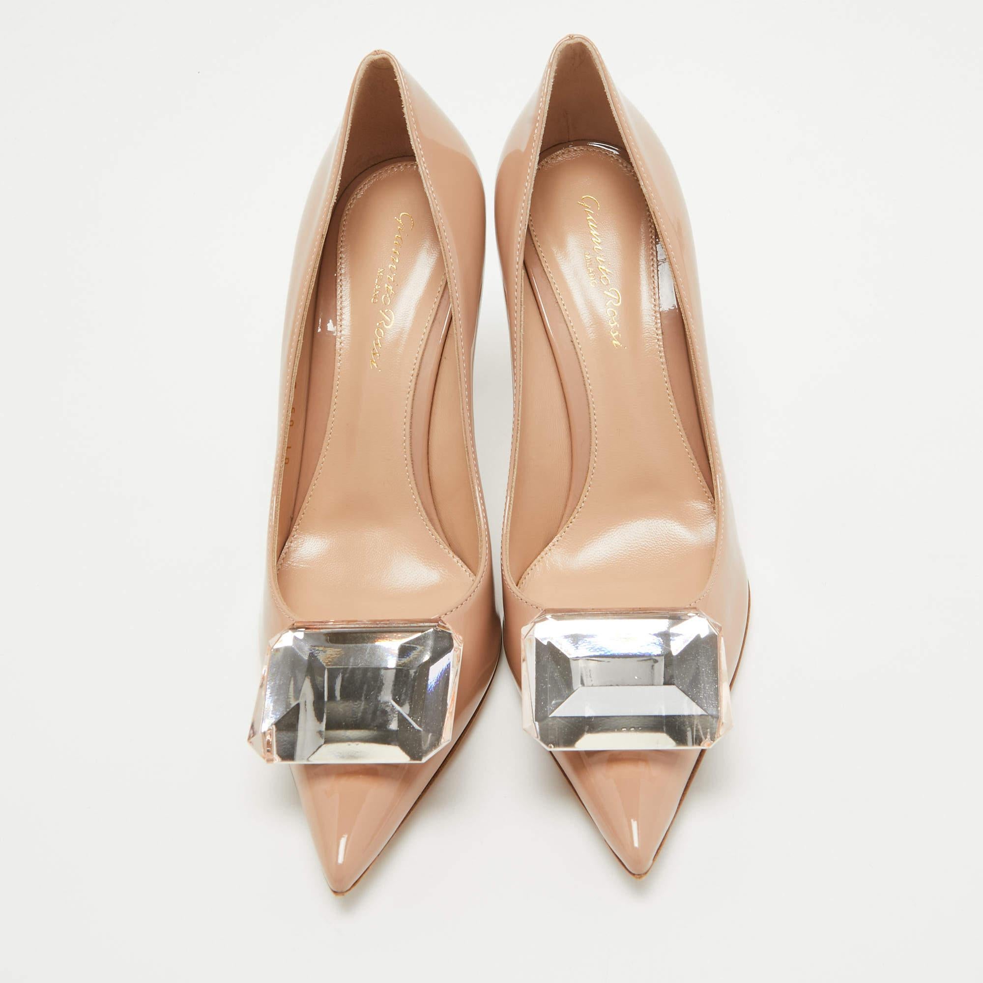 Indulge in elegance with Gianvito Rossi's Jaipur pumps. Crafted with exquisite precision, these pumps boast a lustrous patent leather finish in a captivating shade of pink. Their sleek silhouette and pointed toe design effortlessly elevate any