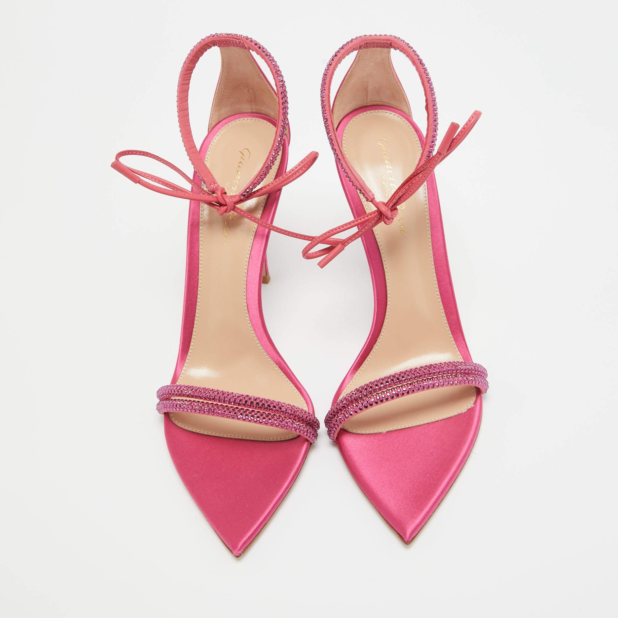 Delicate straps studded with crystals are laid over the toes and at the ankles to form this stunning Montecarlo design by Gianvito Rossi. Dreamy in pink, the beauties are complemented with pointed-toe beds and 11 cm high heels.

Includes
Original