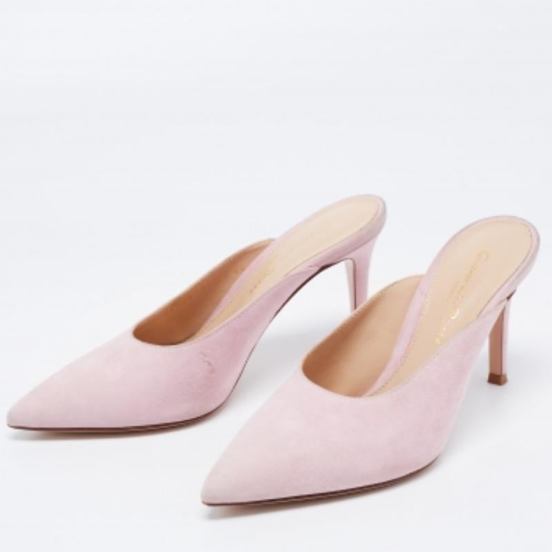 If you love classy but minimal in style, then these Gianvito Rossi mules are the perfect option for you. Created from suede, they feature pointed toes, precise cut, and 8cm heels.