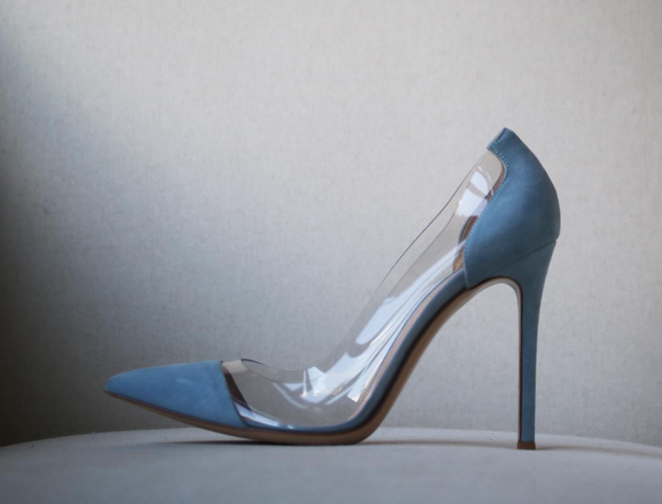 Gianvito Rossi's 'Plexi' pumps are made with clear PVC panels and a sleek pointed toe to create the illusion of longer legs. Crafted from textured suede, this pair is set on a 105mm stiletto heel and designed in a versatile powder blue that will go
