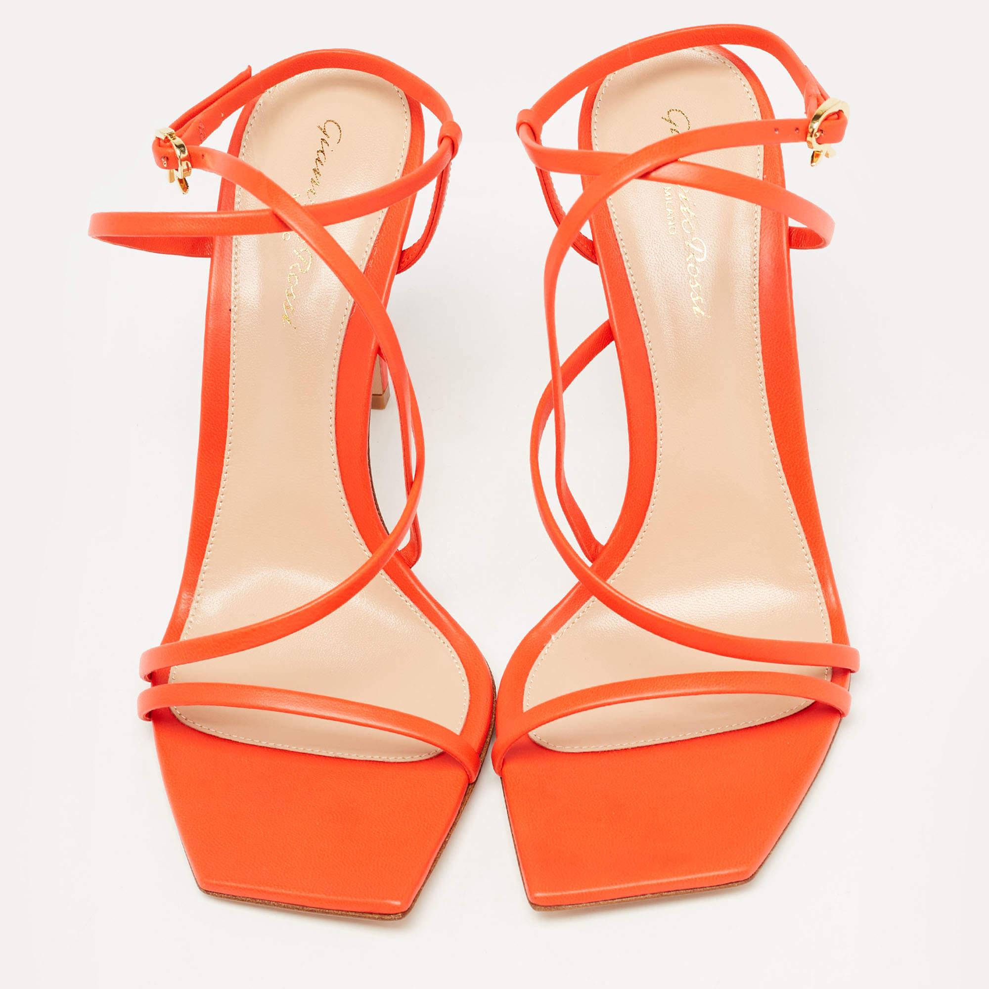 In vibrant poppy red leather the Gianvito Rossi Manilla sandals exude confident charm. Delicate straps gracefully embrace the foot while a sturdy heel provides stability and style. With impeccable craftsmanship and timeless design these sandals