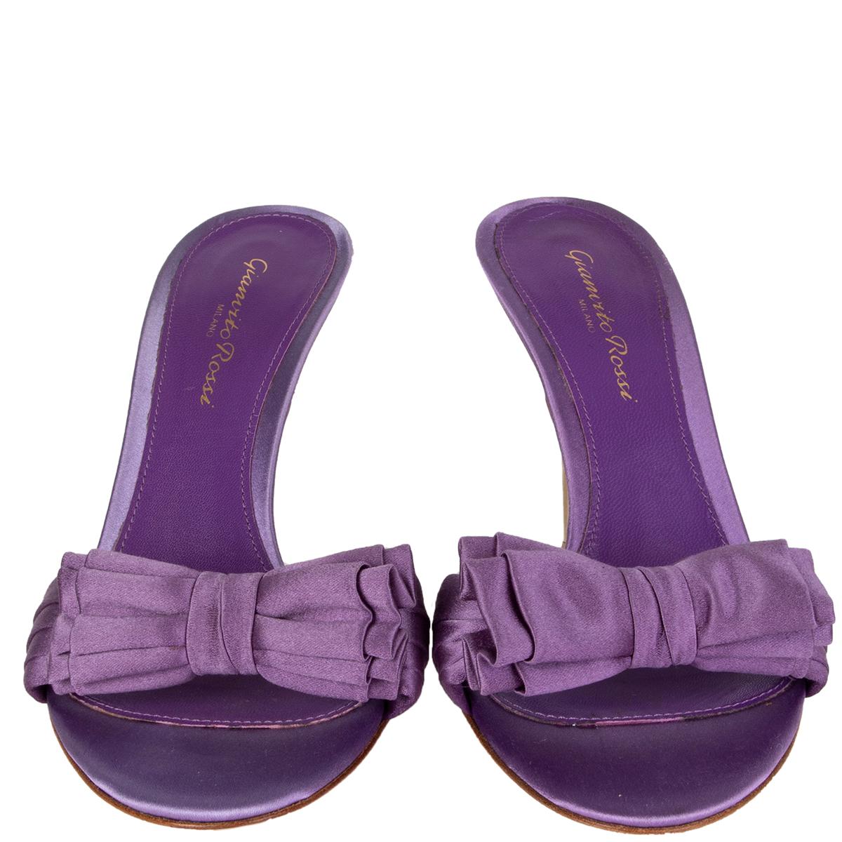100% authentic Gianvito Rossi mules in lilac satin with bow detail on top. Brand new. 

Measurements
Imprinted Size	37
Shoe Size	37
Inside Sole	24cm (9.4in)
Width	7.5cm (2.9in)
Heel	10cm (3.9in)

All our listings include only the listed item unless