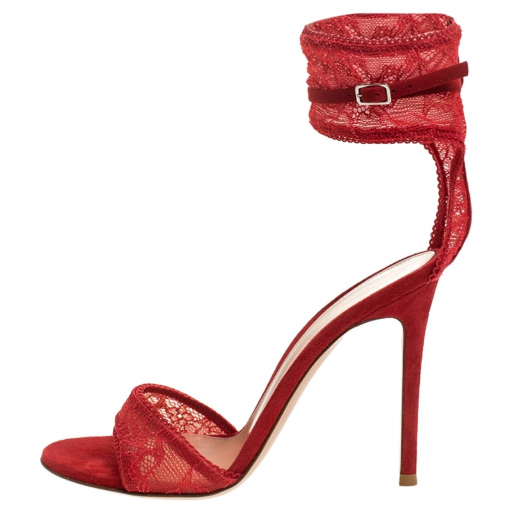 Flaunt your love for fashion when you wear these sandals from Gianvito Rossi. They have been crafted from lace as well as suede in an open-toe design. The sandals feature single vamps straps, raised ankle straps and 10.5 cm heels.

Includes: The
